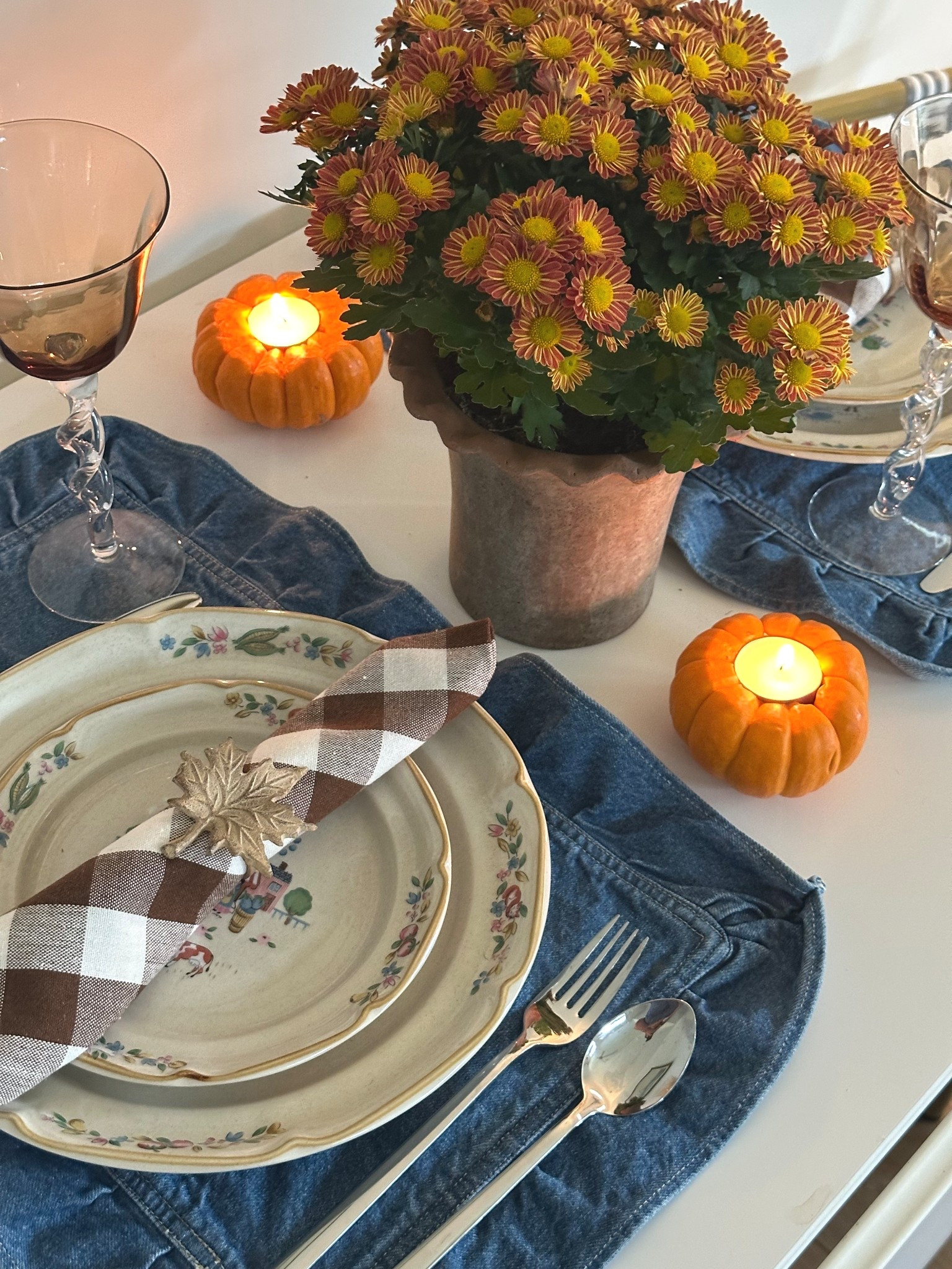 Biggest downfall about our home is the lack of space for a dining area ☹️ — and honestly, it’s something I should’ve made a priority when house shopping. But truthfully, it seems like homes are getting smaller and somehow still cost double the price 🤯.

Contractors seem to think that just having a kitchen island is sufficient enough for family mealtime (don’t even get me started — I could rant about this for days 😅).

However, with a little modification and inspiration from my favorite romcom movies 🎬💕, I’ve made the most of our open floor plan by creating a tiny dining space in our small living room. Nearly every night, we pull up River’s high chair to this little table, say our prayers to the Lord 🙏🏼, enjoy a home-cooked meal 🍲, and laugh and talk as a family.

Having a tiny table hasn’t stopped us from having family dinners — and it certainly hasn’t stopped me from making small tablescapes 🕯️✨. And yes, we really do eat like this — candles lit and all! 🤎🍂🤍

Because dinner is meant to be a cozy, special time for family — even on an ordinary Tuesday 🤍

// Linked everything I could on my @shop.ltk @ltk.home
#home #homedecor #fall #falldecor #tablescape


#LTKHome #LTKSeasonal