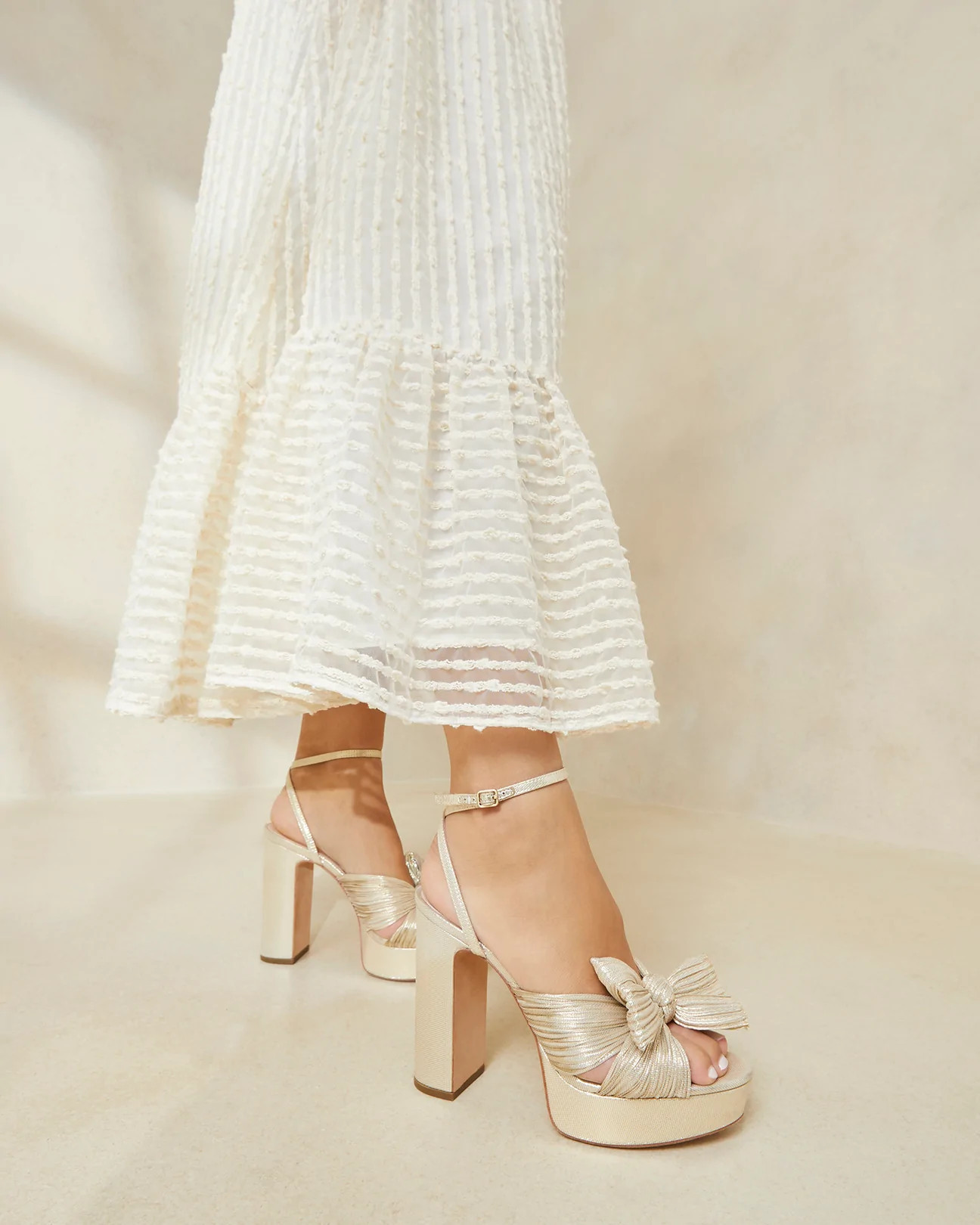 Natalia Platinum Platform Bow Heel | Loeffler Randall