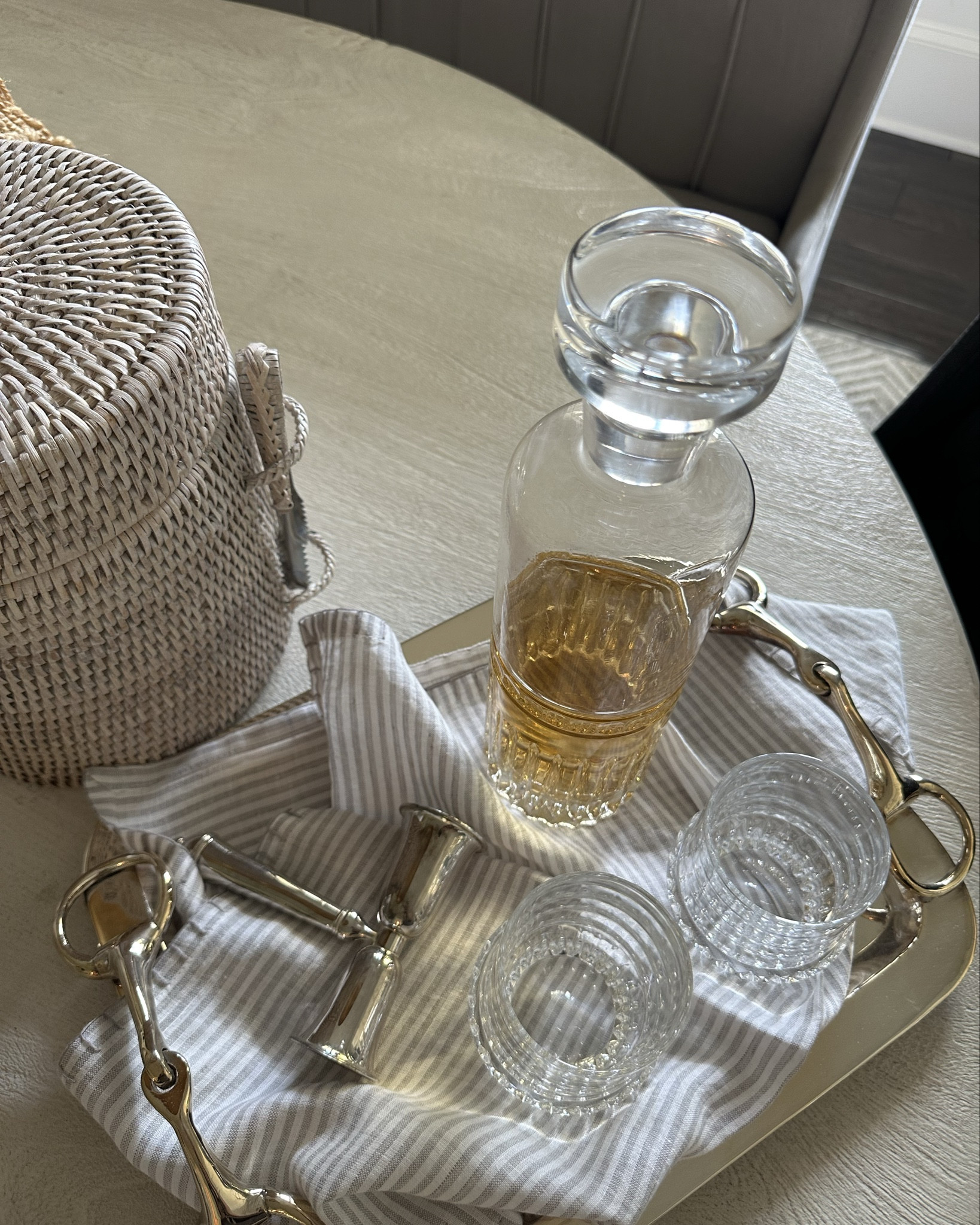Vintage meets new for cocktails at home.

Crystal decanter, silver bartools, wicker ice bucket, crystal old fashioned glasses, linen napkins, hosting 

#LTKHome