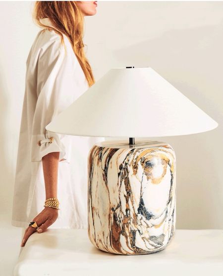 BLOCK GOLDEN CALACATTA MARBLE TABLE LAMP
Calacatta gold table lamp by Melbourne-based VUUE pairs clean lines with an elevated mix of materials. The lamp features a Calacatta gold marble base topped with a crisp white linen shade. Considered details include touches of black steel in the harp and finial. CB2 exclusive.

#LTKHome #LTKStyleTip
