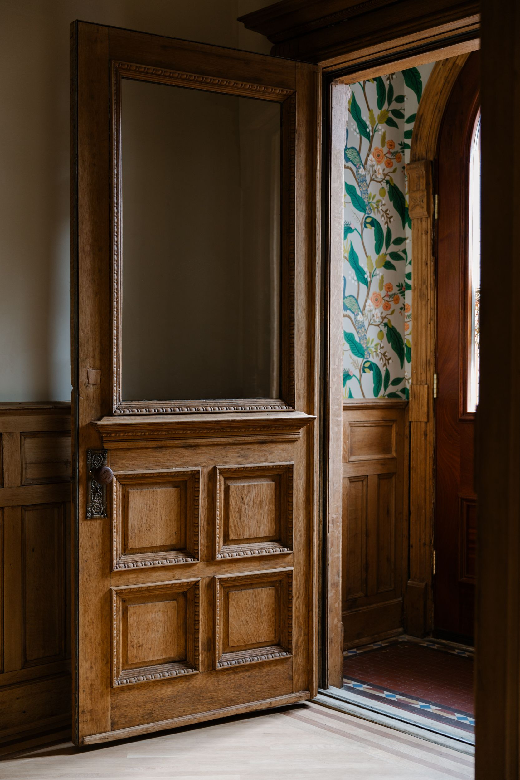 A good wallpaper can make a regular entryway feel so unique! 

 