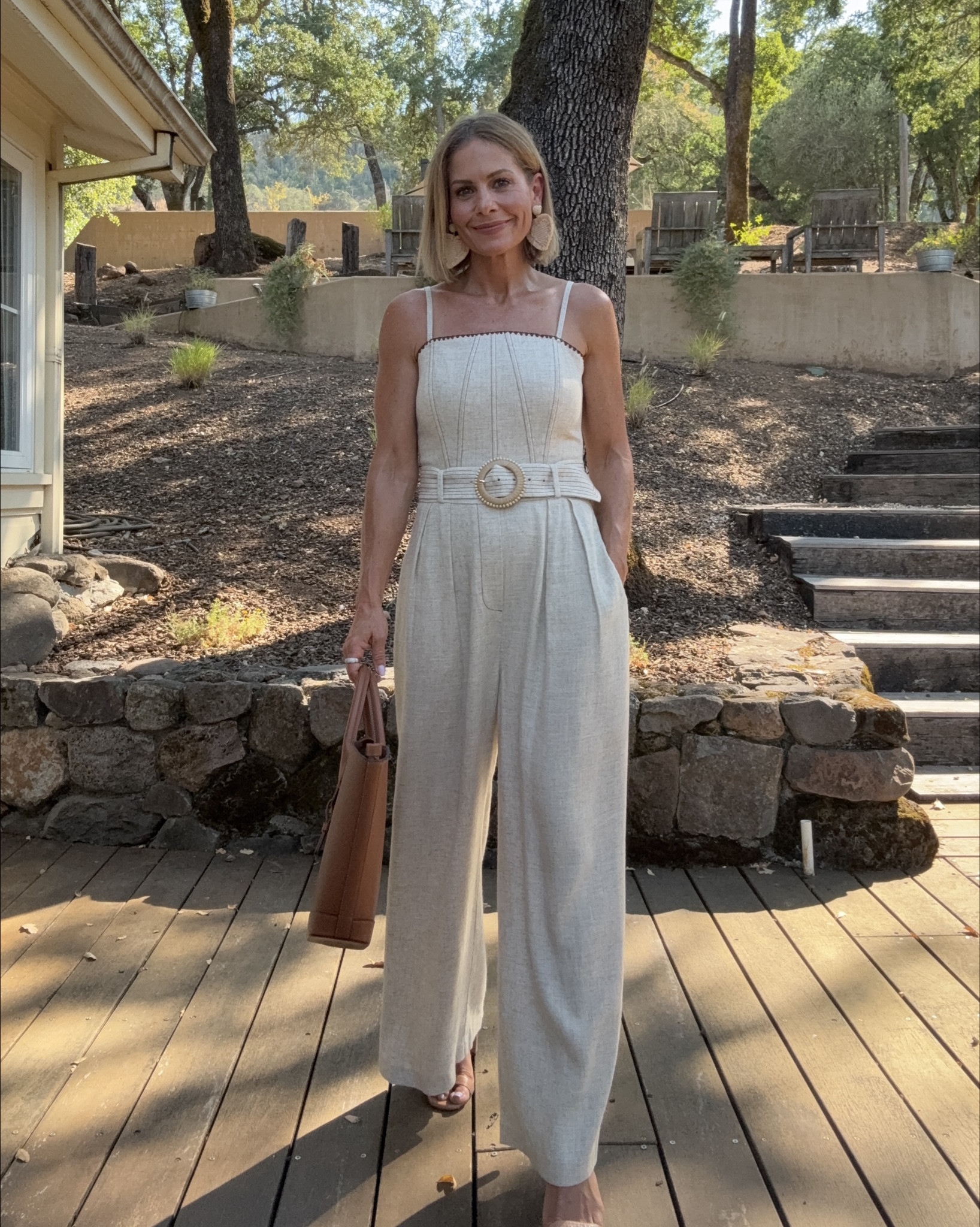 Summer evenings, church, business casual. It’s all about linen. 
This jumpsuit is supposed to fit cropped, but for a petite like me, it was the perfect ankle length. No hem required. Also, loving my Paris 64 bag. I get so many compliments on the design and structure  

#LTKPetite #LTKSeasonal #LTKOver40