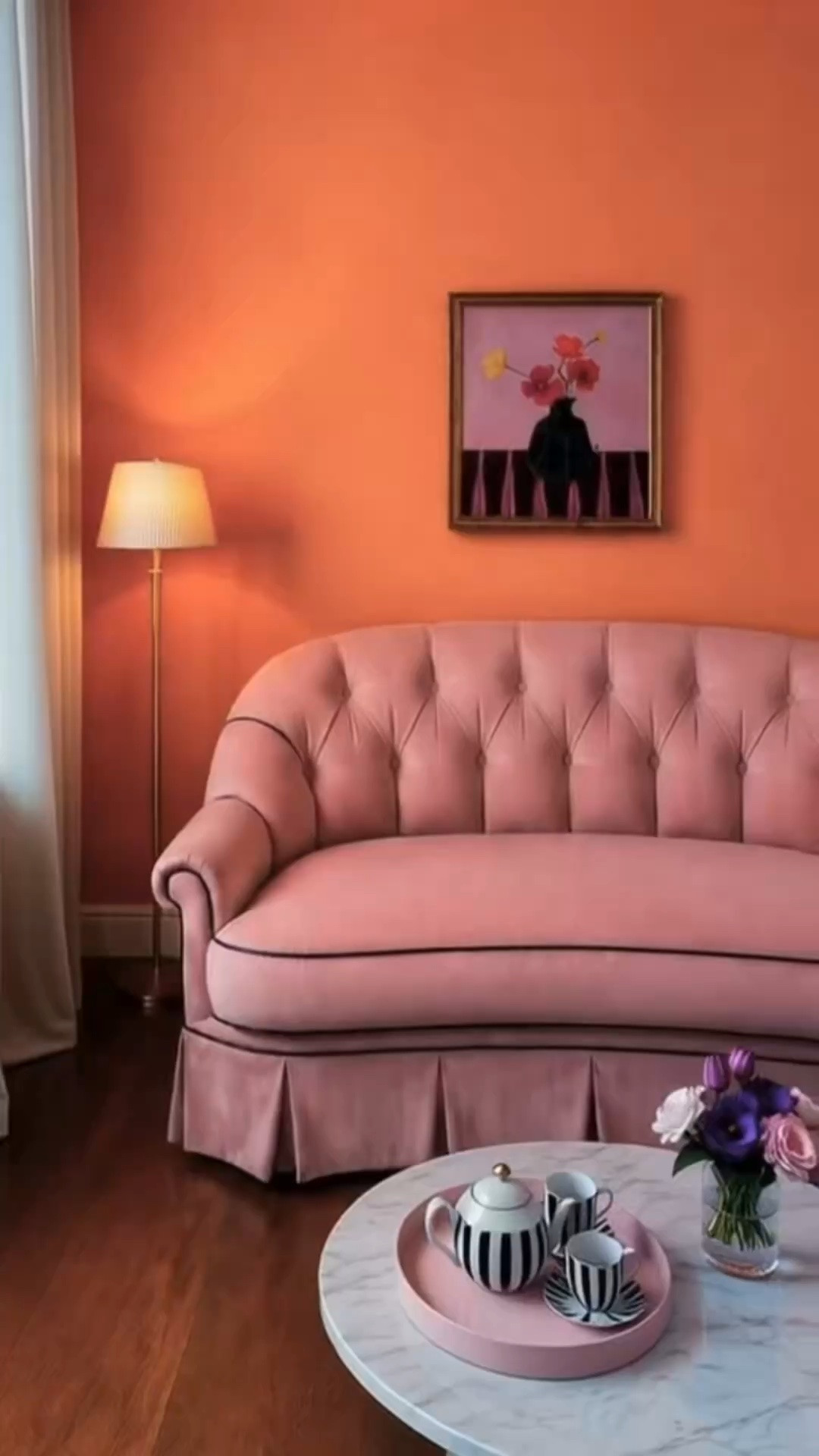 Unwind in this lovely corner at home. Whether in a bedroom, reading room, or living room, this elegant skirted loveseat creates the perfect place to relax.

The graceful curves, tailored skirt, and dusty pink upholstery give it a timeless, inviting feel. It instantly softens a room and adds a warm, romantic touch.

The vibrant orange wall paired with the dusty pink loveseat creates a bold yet elegant contrast that feels both stylish and calming.

Finished with art, a classic table lamp, and a marble coffee table, this is a corner you’ll return to again and again.

#loveseat #skirtedloveseat #art #wallart #marblecoffeetable #tablelamp #readingroom #livingroomdecor #bedroomdecor #pinksofa #orangewall #colorcontrast #romanticdecor #eleganthome #classicstyle #timelessdesign #cozycorner #homedecor #interiordesign #ltkhome

#LTKdayinmylife #LTKHome #LTKSaleAlert