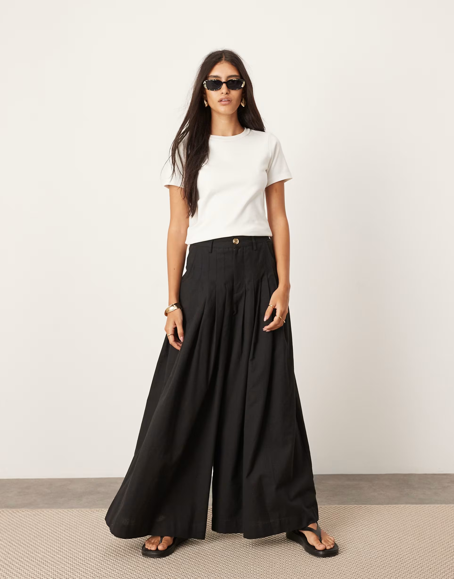 ASOS EDITION ultra wide leg linen look low rise pleat front pants in black | ASOS (Global)