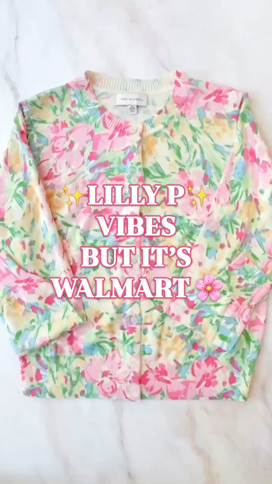 Lilly Pulitzer look for less, Walmart floral cardigan, Palm Beach style, preppy work outfit, spring cardigan

This Walmart floral cardigan has the happiest Lilly P color palette, and it is exactly the kind of $24 find that makes people ask where you got it.

The pink, green, yellow, and blue watercolor floral print gives that bright Palm Beach style feel, while the crewneck, button front, ribbed trim, and easy cardigan shape make it so wearable. Button it as a top, layer it over a tank, toss it over your shoulders, or wear it with white denim when an outfit needs one more pretty layer.

The fabric is 60% cotton and 40% modal, which is why it feels much better than a Walmart cardigan should. Soft, smooth, lightweight, breathable, and easy for spring and summer outfits.

This is the cardigan for work outfits, teacher outfits, business casual outfits, brunch, church, vacation outfits, office outfits, lunch dates, and summer weekends when you want the outfit to feel bright, feminine, and pulled together without spending Lilly money.

XS to 4X.

lilly pulitzer look for less, lilly pulitzer cardigan look for less, lilly pulitzer inspired cardigan, floral cardigan women, pink floral cardigan women, spring cardigan women, crewneck cardigan women, button front cardigan women, lightweight cardigan women, cotton modal cardigan women, soft cardigan women, preppy cardigan women, work cardigan women, teacher cardigan women, business casual cardigan women, walmart fashion finds, walmart cardigan women, free assembly cardigan, colorful cardigan women, palm beach style women

#LTKFindsUnder50 #PreppyStyle #LookForLess #SpringCardigan #WalmartStyle #WalmartFinds #LillyPulitzer

#LTKSeasonal #LTKOver40 #LTKWorkwear