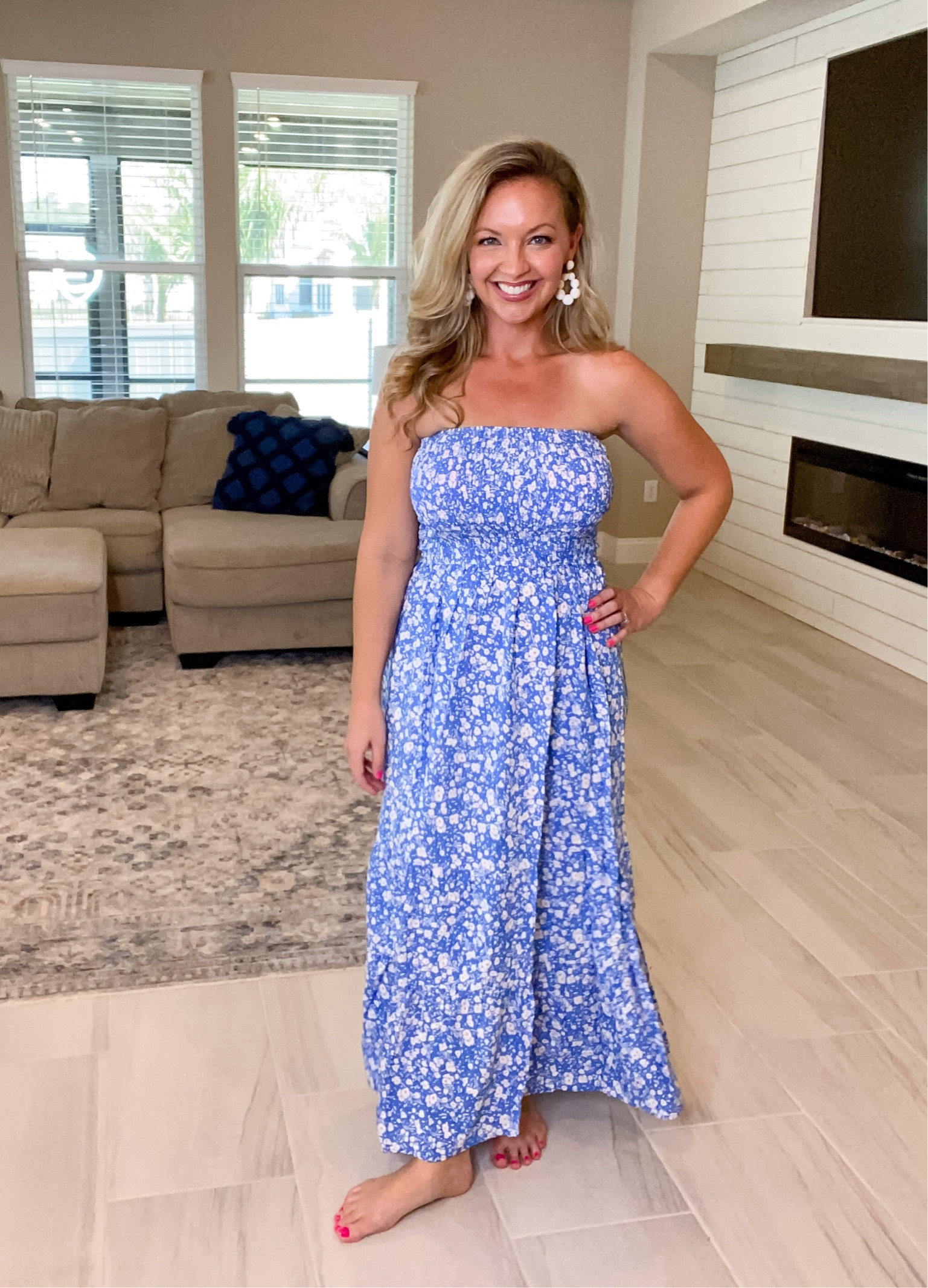 I have a love for all things BLUE right now! This blue and white floral maxi dress is such a great summer dress or vacation dress!  I am 5'5" Size 8 wearing a Medium.  #amazonfashion #summerdress #maxidresss #springbreakoutfit #bluedress #beachdress #vacationdress #midsize 

 #LTKSeasonal #LTKMidsize #LTKFindsUnder50