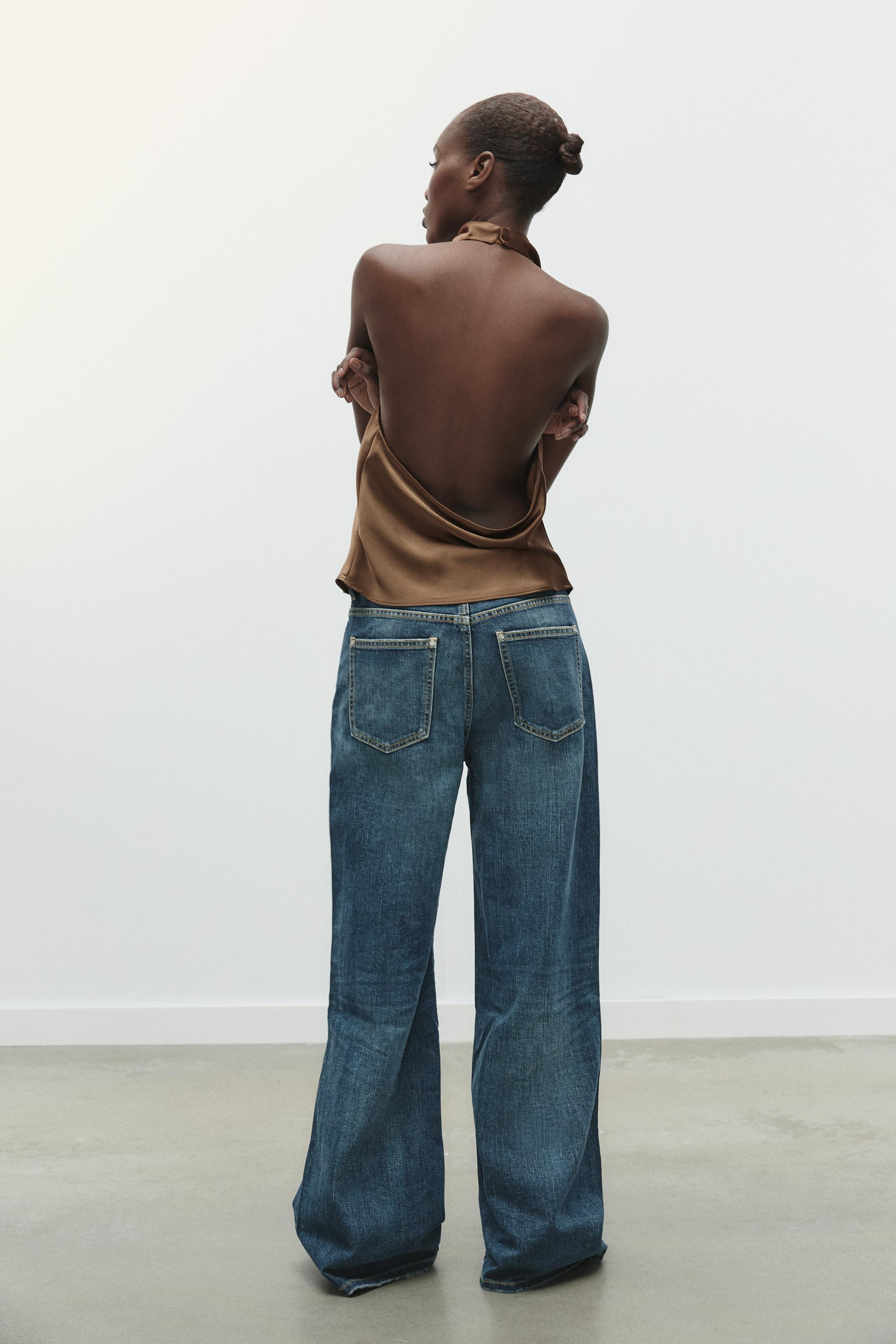 Halter neck top with open back. Hidden button closure at back. | Zara US