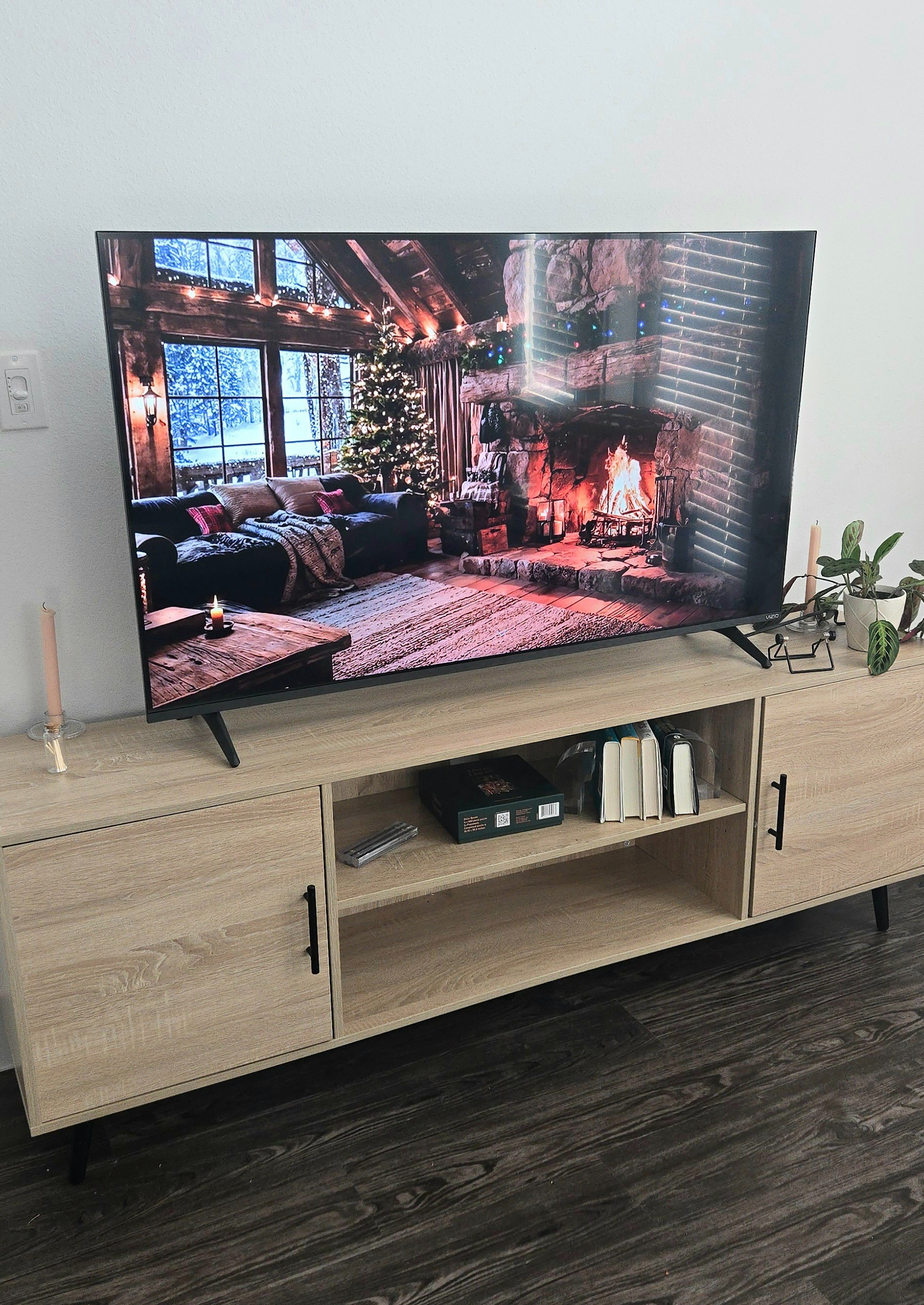 Love this brown TV stand in my place. Its perfect for storing items that I want to hide.

#LTKHome