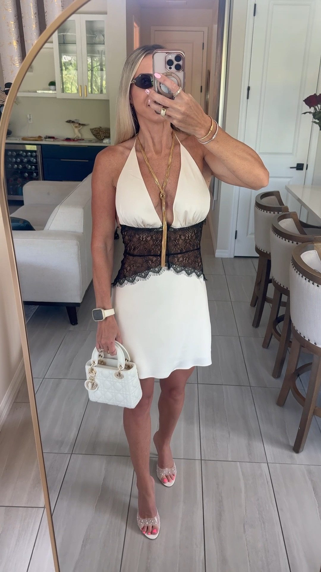 This is the kind of dress I save for a night that actually feels special 🤍🖤 The contrast between the white satin and black lace makes it feel elegant without being too formal, and I love how flattering the waist detail is. Perfect for anniversaries, birthday dinners, celebrations, or any dressier night out. Wearing size Small.

special occasion dress, anniversary dinner dress, birthday dinner outfit, elegant date night dress, black and white dress, lace satin dress, halter dress, celebration outfit, evening dress, MESHKI dress

#LTKootd #LTKTravel #LTKOver40