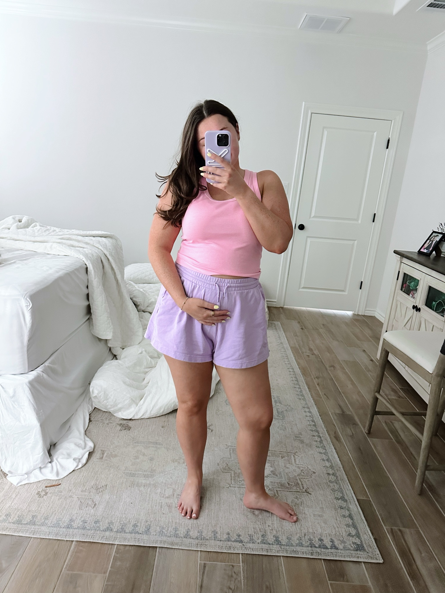 I got these sweat shorts when I was postpartum with madden and wore the heck out of them last summer!! we will see how long I can rock them with my new bump coming in quick! They don’t make the exact ones I have any more but I’ll link similar!!
Size: large! 
Tank is old from target! 

#LTKBump #LTKMidsize