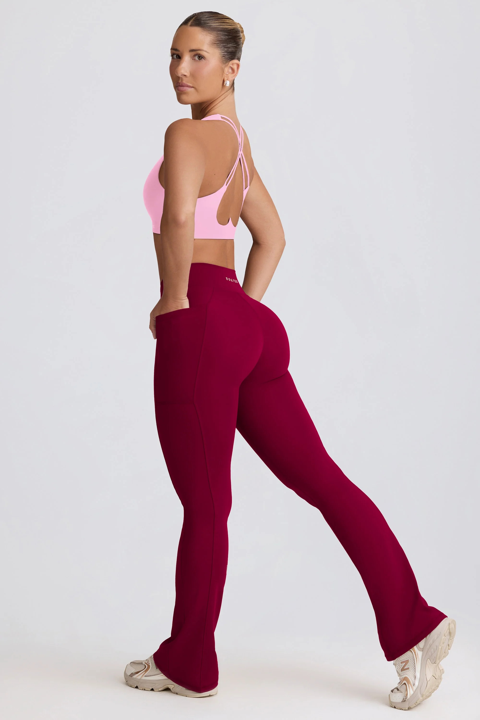 Soft Active Crossover Flared Trousers in Burgundy | Bo+Tee