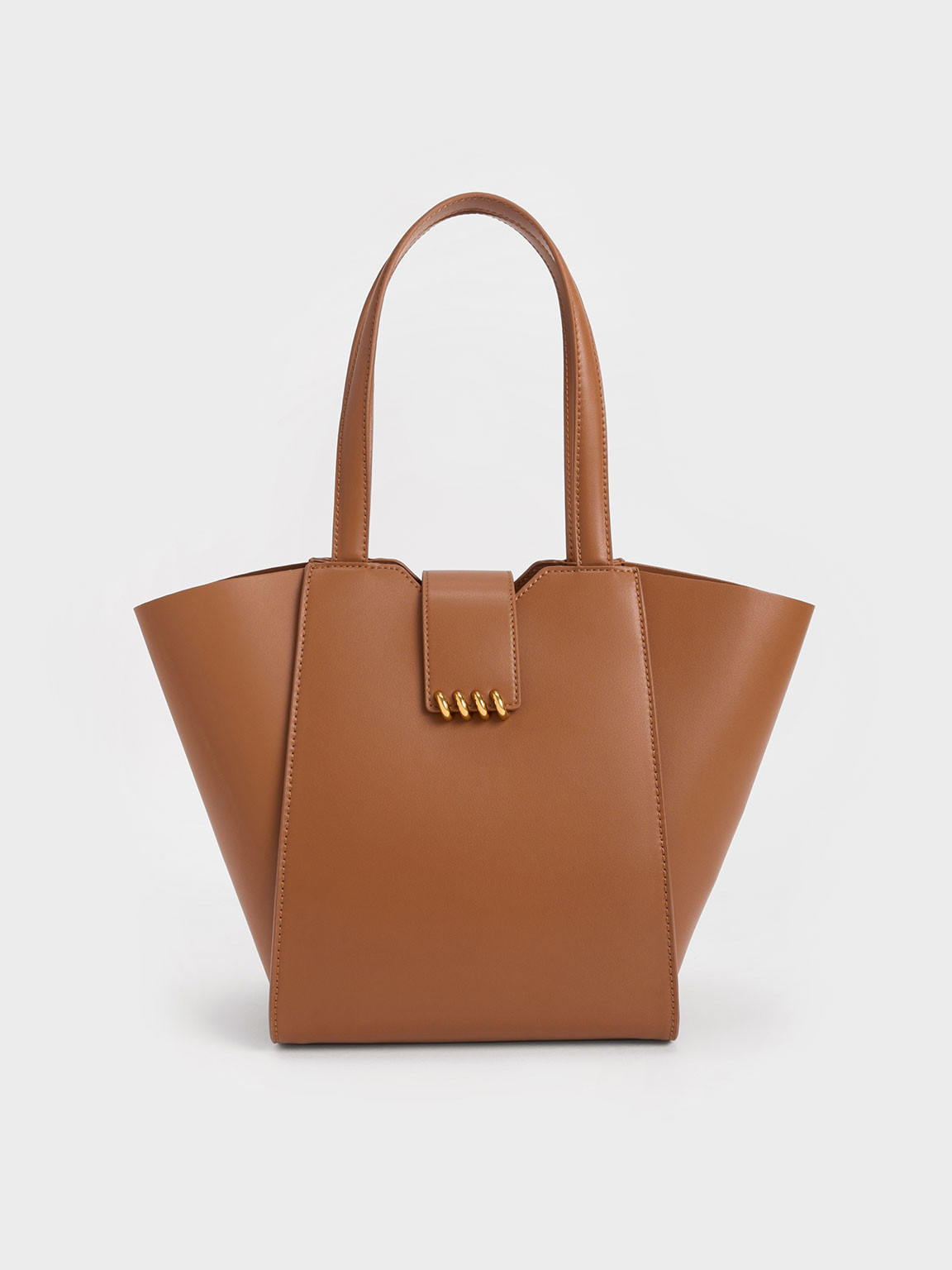 Choco Osiris Metallic Accent Trapeze Tote | CHARLES & KEITH | Charles & Keith CA