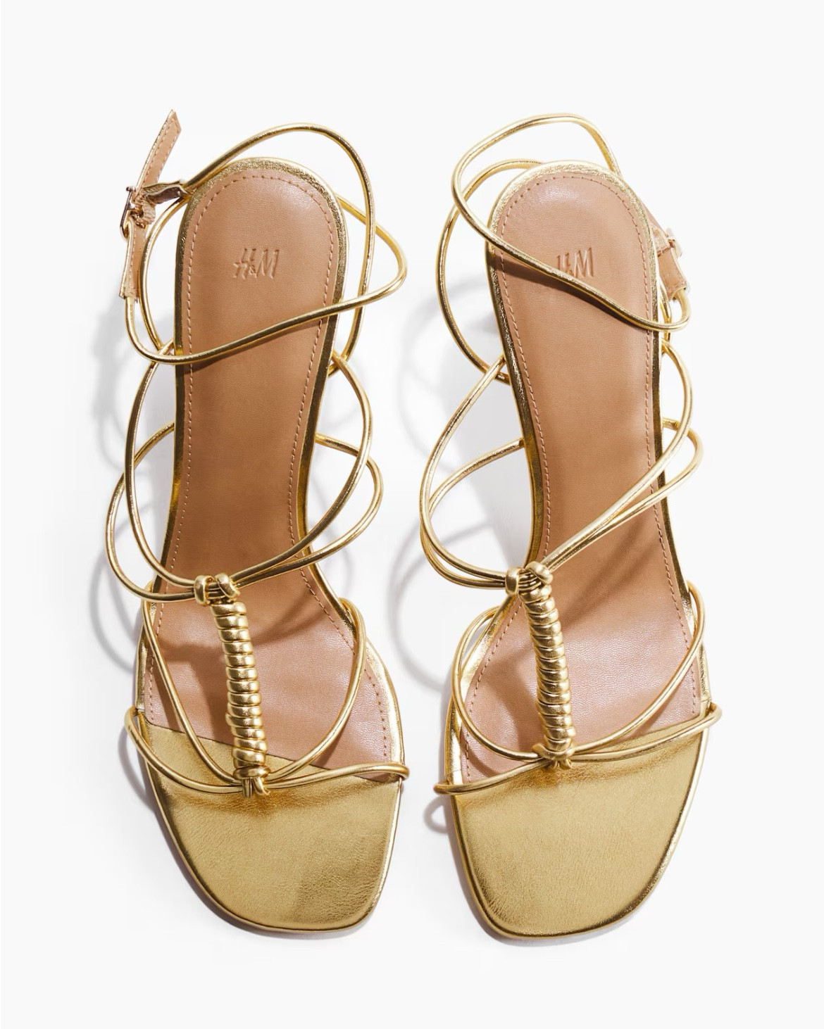 Strappy gold heeled sandals 

#LTKSeasonal
