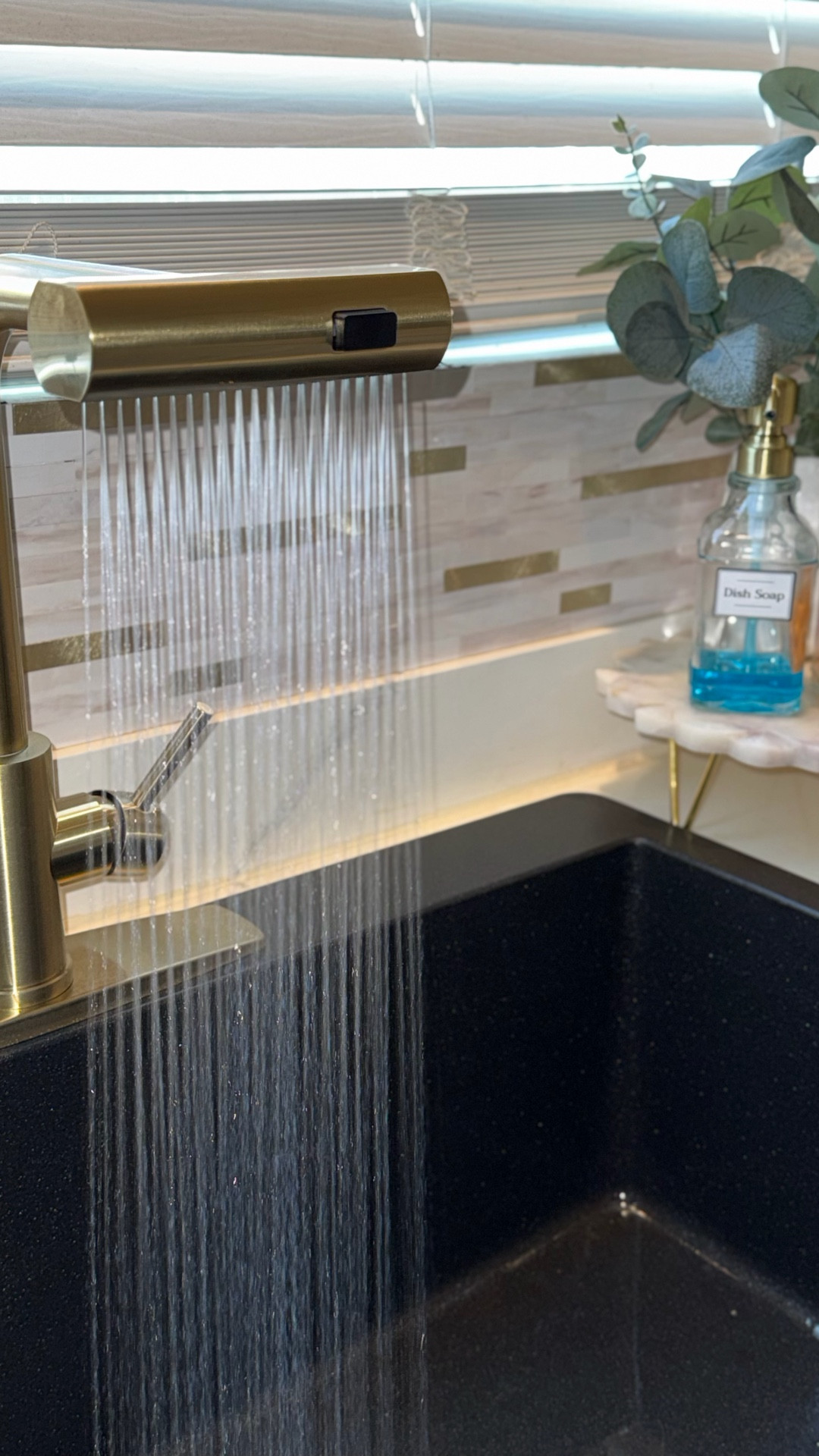 Elevate your kitchen with this sleek & modern waterfall kitchen faucet 😍 

#diyhomeimprovements

#LTKHome #LTKSaleAlert