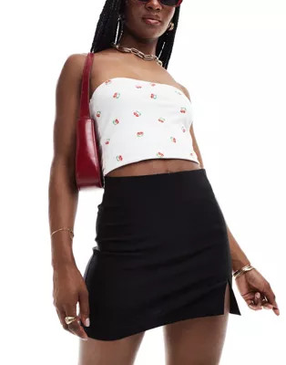 Minifalda negra con detalle de abertura de bengalina de ASOS DESIGN | ASOS | ASOS (Global)