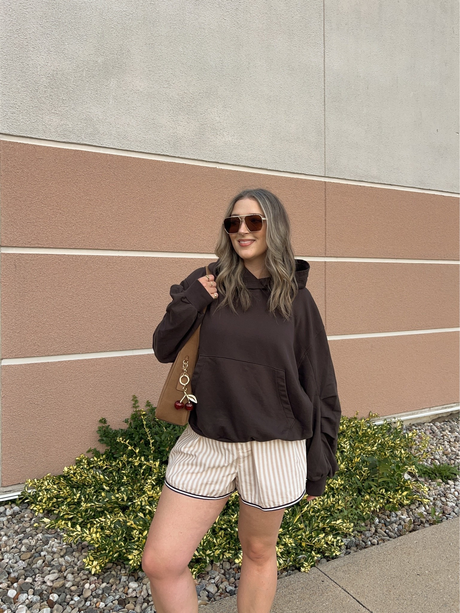 Comfy early fall outfit! Wearing M in the chocolate brown hoodie. Wearing L in the striped boxer shorts but should have done M (exact Canadian shorts link under “similar products”). I’m a 9.5-10 shoe and wear a 40 in the Birkenstock clogs

#LTKfall #LTKsale #LTKmidsize