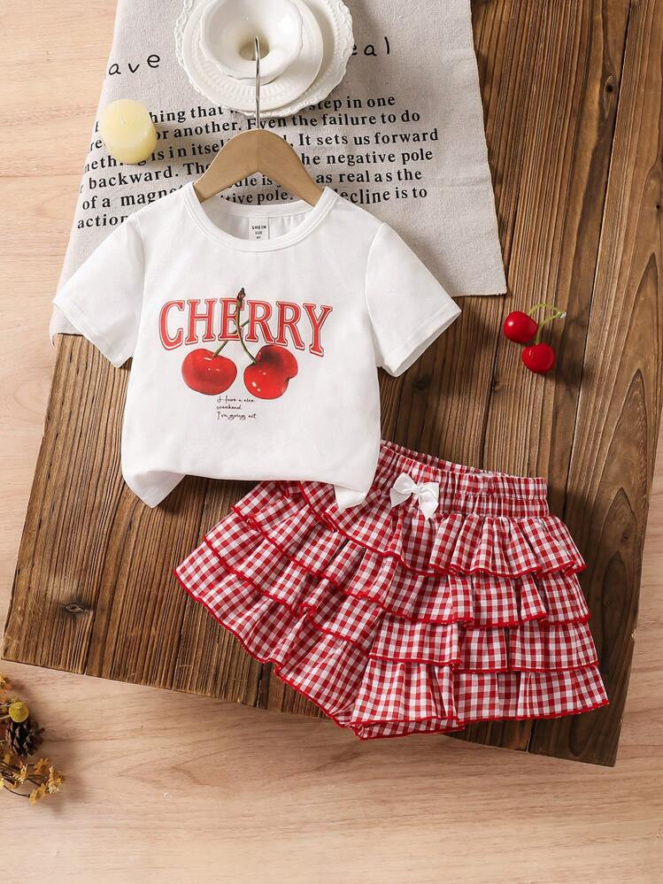 SHEIN LMoss Kids LMoss   2pcs Young Girl Cherry Print Knit T-Shirt And Woven Plaid Skirt Set | SHEIN
