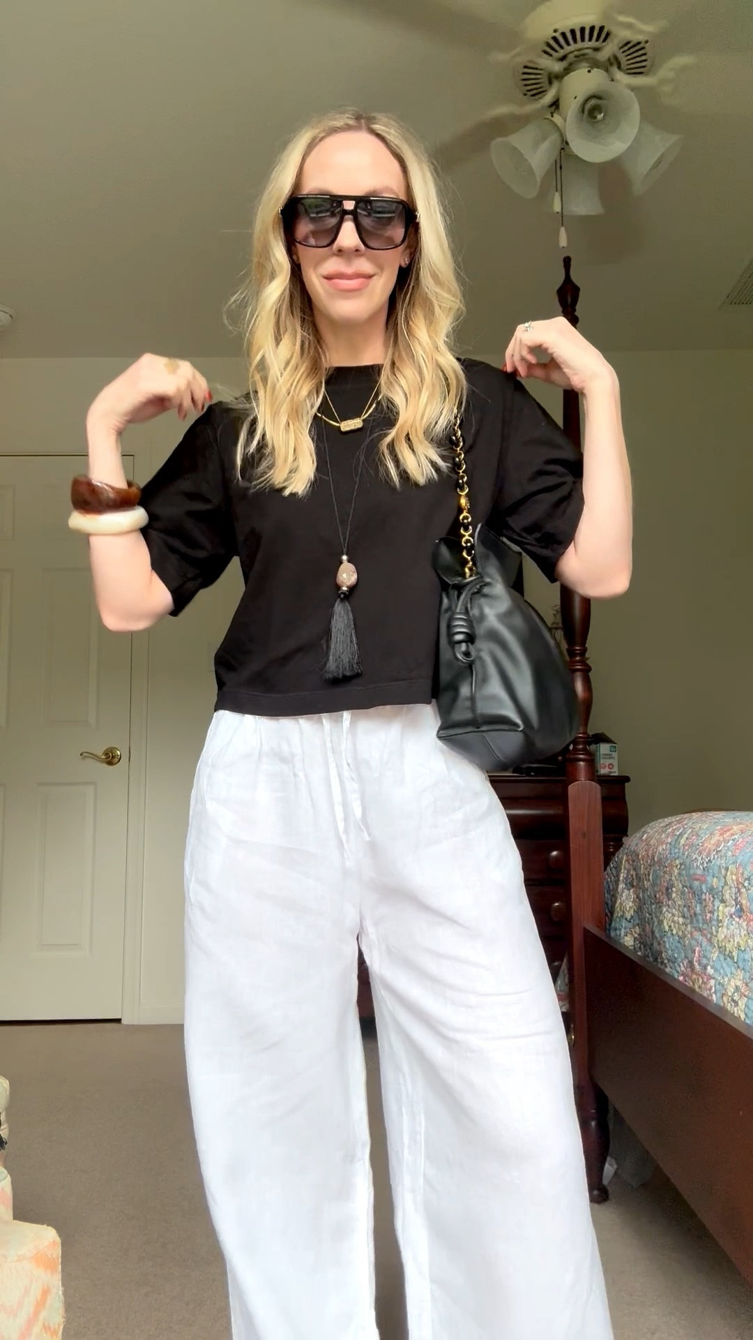 Fun tassel pendant necklace on sale @Madewell! 

Black and white summer outfit, summer vacation, beach vacation, white wide leg linen pants, jelly shoes

#LTKSaleAlert #LTKTravel #LTKOver40