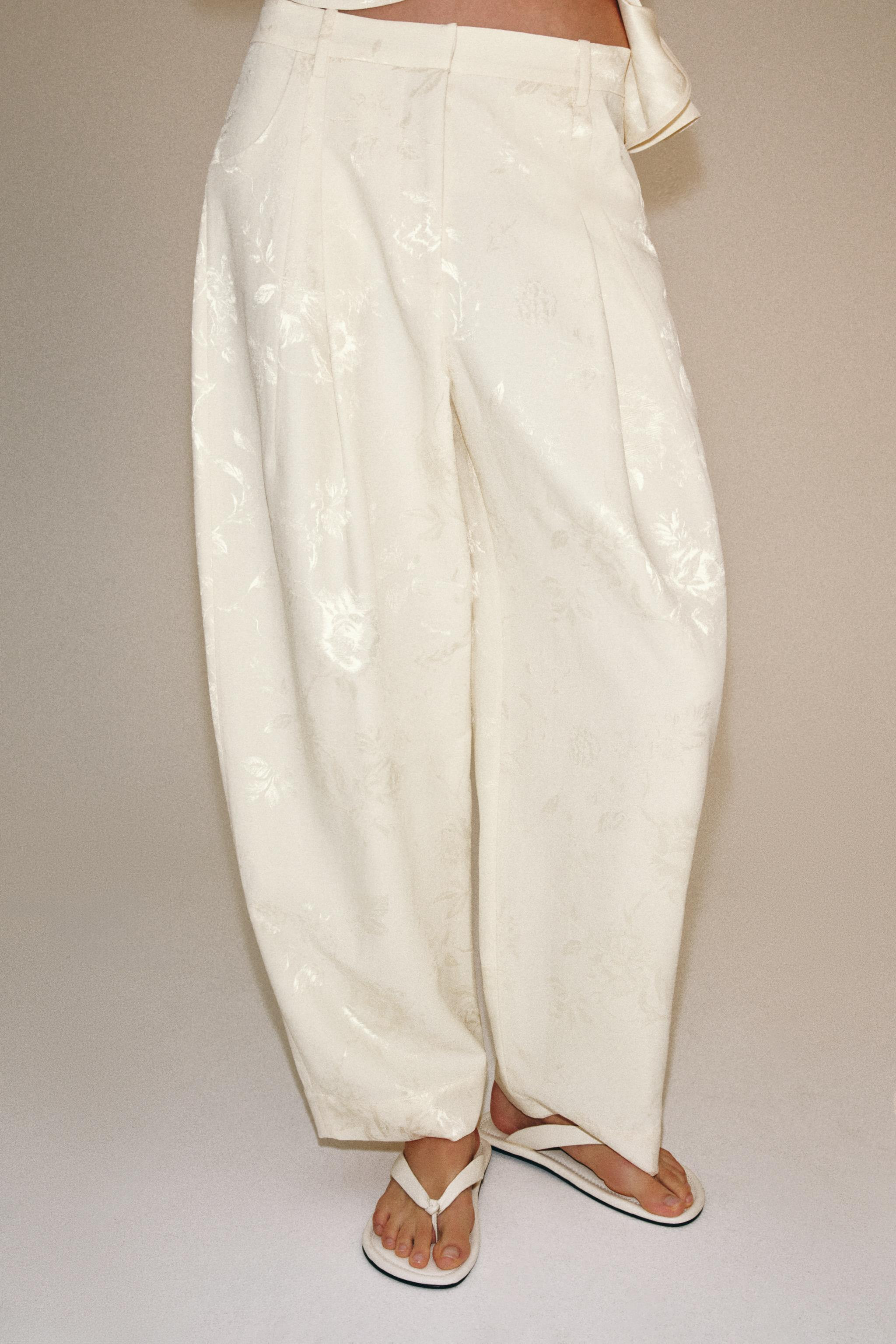 Model height: 179 cmZARA WOMAN COLLECTIONTrousers made from a lyocell blend. Mid-waist with belt ... | Zara UK