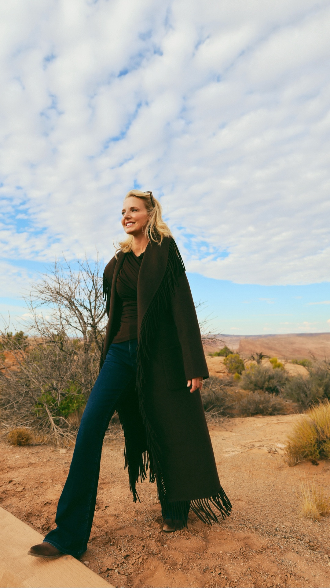 This Jonathan Simkhai wool wrap coat is giving major modern western vibes 🤎 The deep brown is such a chic alternative to black — versatile, rich, and flattering. The fringe detail adds just the right amount of movement and personality. I styled it with a L’Academie long-sleeve top, wide-leg jeans, and dark brown suede booties for a polished, capsule-worthy look you’ll wear all season. This coat really makes a statement while maintaining versatility.
👉 Tap the images below to shop this fall outfit.
~Erin xo 

#LTKOver40 #LTKStyleTip #LTKTravel