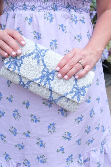 Light blue bow clutch

Preppy grandmillennial style fashion tea dress floral lavender lilac 

#LTKtravel #LTKwedding #LTKFind