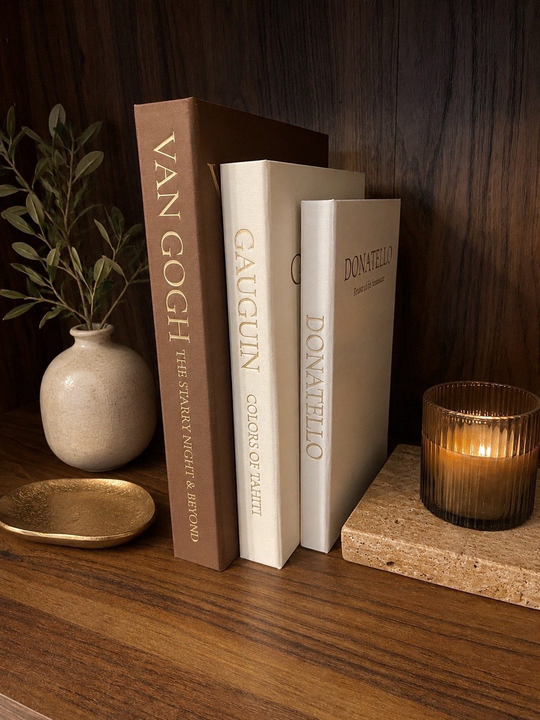 Decorative books are one of my favorite ways to make a shelf look instantly more styled and expensive 🤎 I’m obsessed with this neutral set-the warm brown, cream and white tones, gold detailing and linen-like texture are SO good. They’re gorgeous standing up, stacked on a coffee table or mixed into bookshelf decor for that collected, designer look.

decorative books, decor books, coffee table books, faux books, designer decor books, neutral decor books, decorative book set, bookshelf decor, bookshelf styling, shelf decor, shelf styling, coffee table decor, console table decor, living room decor, home decor, neutral home decor, brown home decor, cream home decor, beige home decor, warm neutral decor, organic modern decor, transitional decor, traditional home decor, luxury home decor, elevated home decor, designer inspired decor, aesthetic home decor, vintage inspired decor, bookcase decor, bookcase styling, library decor, office bookshelf decor, home office decor, living room bookshelf, decorative accessories, shelf accessories, neutral shelf decor, brown and cream decor, gold accent decor, linen books, decorative book stack, stacked books decor, hardcover decor books, faux coffee table books, Amazon home decor, Amazon home finds, affordable home decor, designer look for less, LTK home finds, home styling ideas

#LTKSeasonal #LTKHome