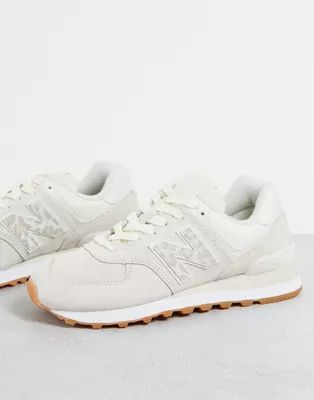 New Balance 574 sneakers in white and animal print | ASOS (Global)