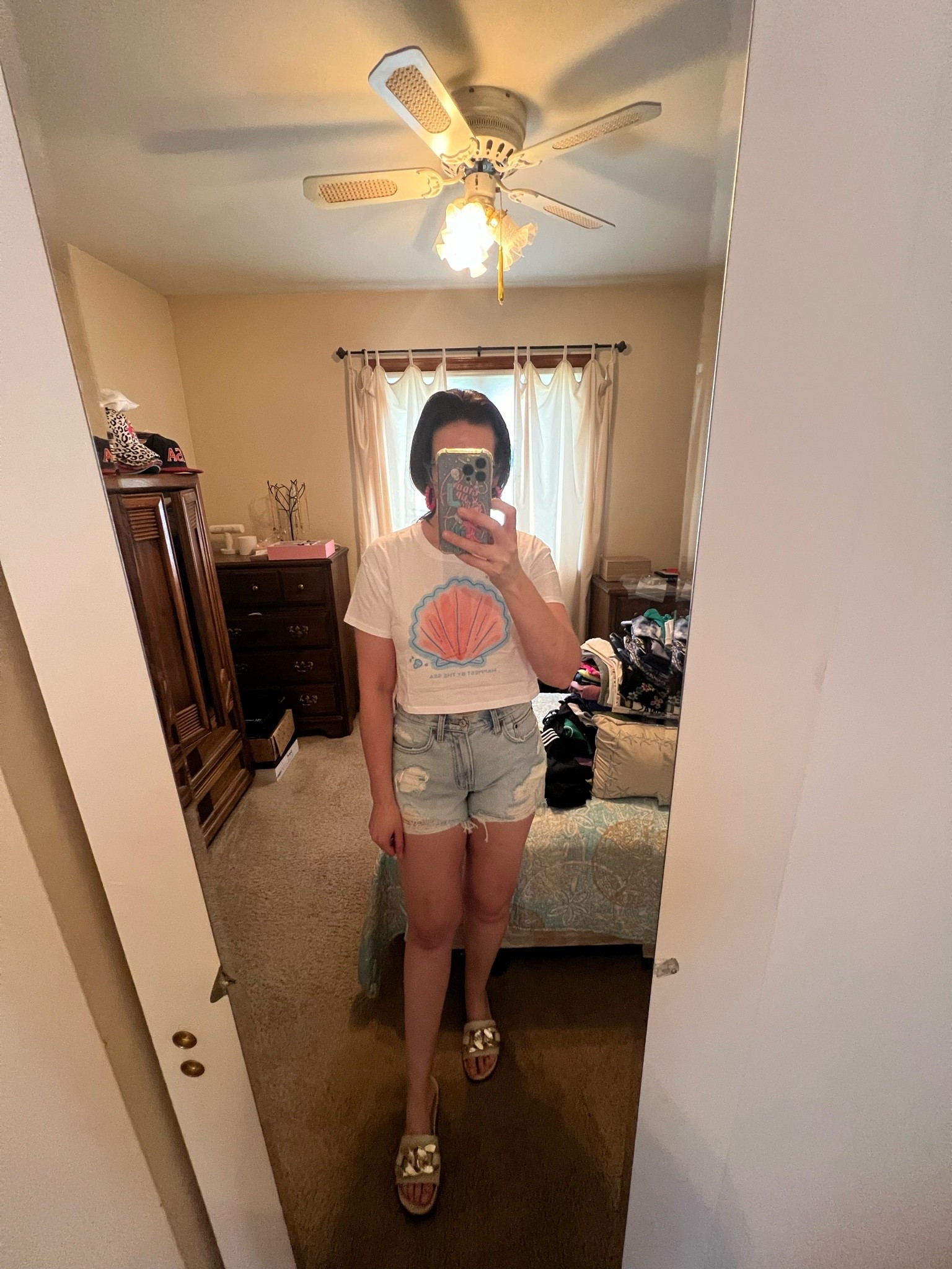 Cropped seashell white tshirt (s). High waisted distressed shorts (27). Cream and gold chunky sandals (8.5). #tshirt #seashelltshirt #croppedtshirt #shorts #distressedshorts #highwaistedshorts #sandals #creamsandals #chunkysandals #goldsandals #summeroutfits 
summer outfits 
vacation outfits beach

#LTKootd #LTKSeasonal