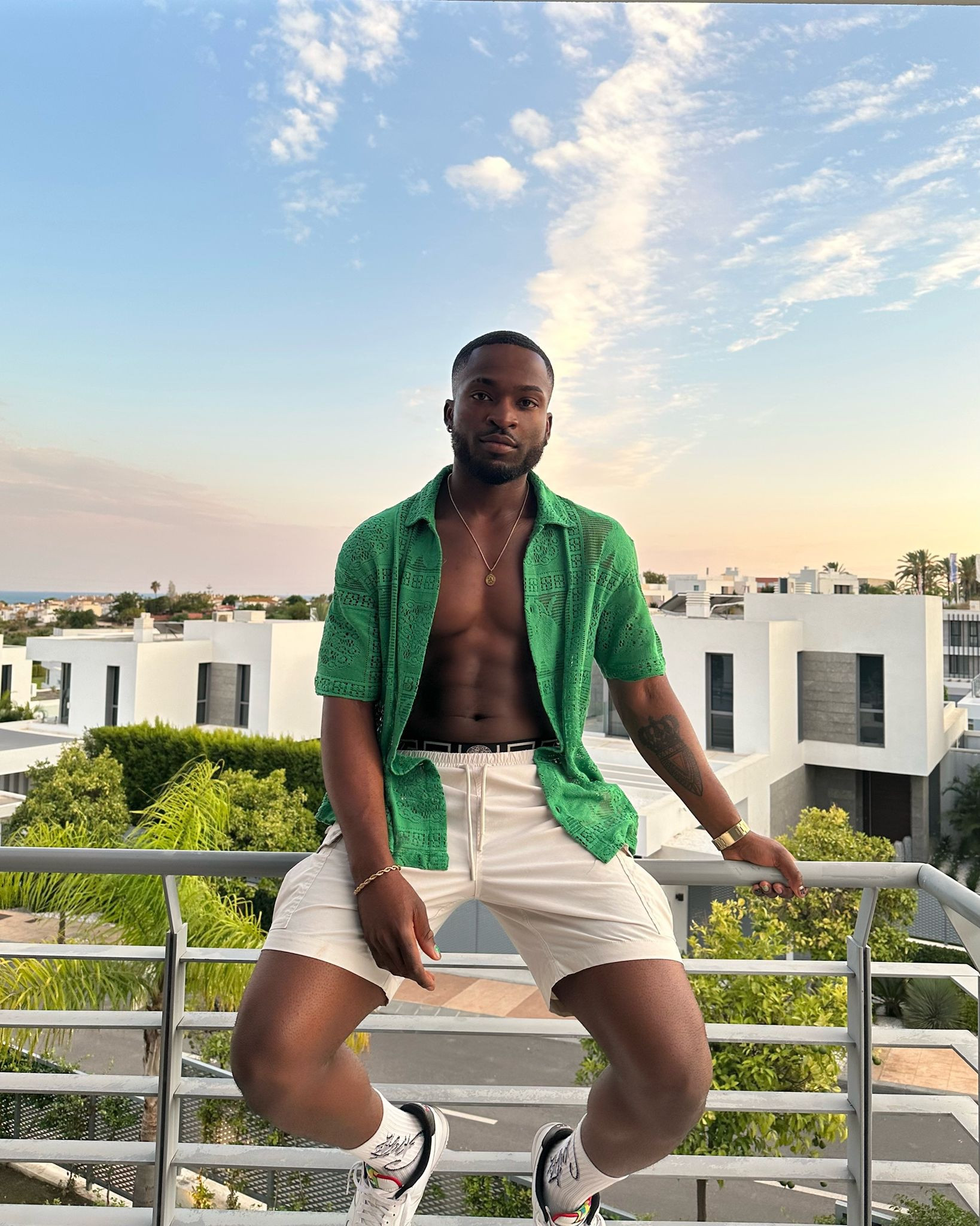 Green lace shirt, crochet shirt, cream men’s short, Versace boxer shorts, white air force 1s, gold fossil watch, men’s fashion, holiday outfit 

#LTKmens #LTKSeasonal #LTKstyletip