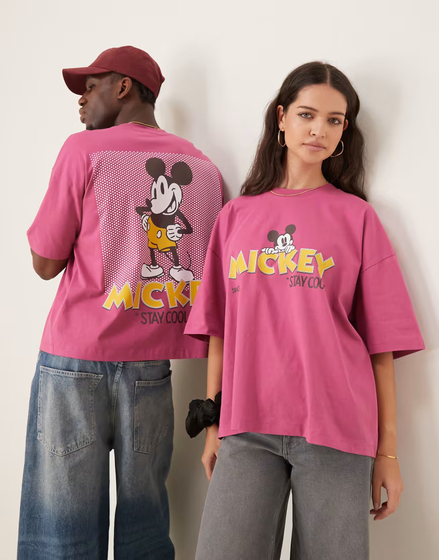ASOS DESIGN Disney unisex oversized t-shirt with Mickey Mouse prints in pink | ASOS (Global)