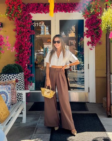Cropped satin blouse and high waist wide-leg trouser pants (only $69). Transitional outfit inspo. Currently loving this small tote gold bag 

#LTKfindsunder100 #LTKstyletip #LTKitbag