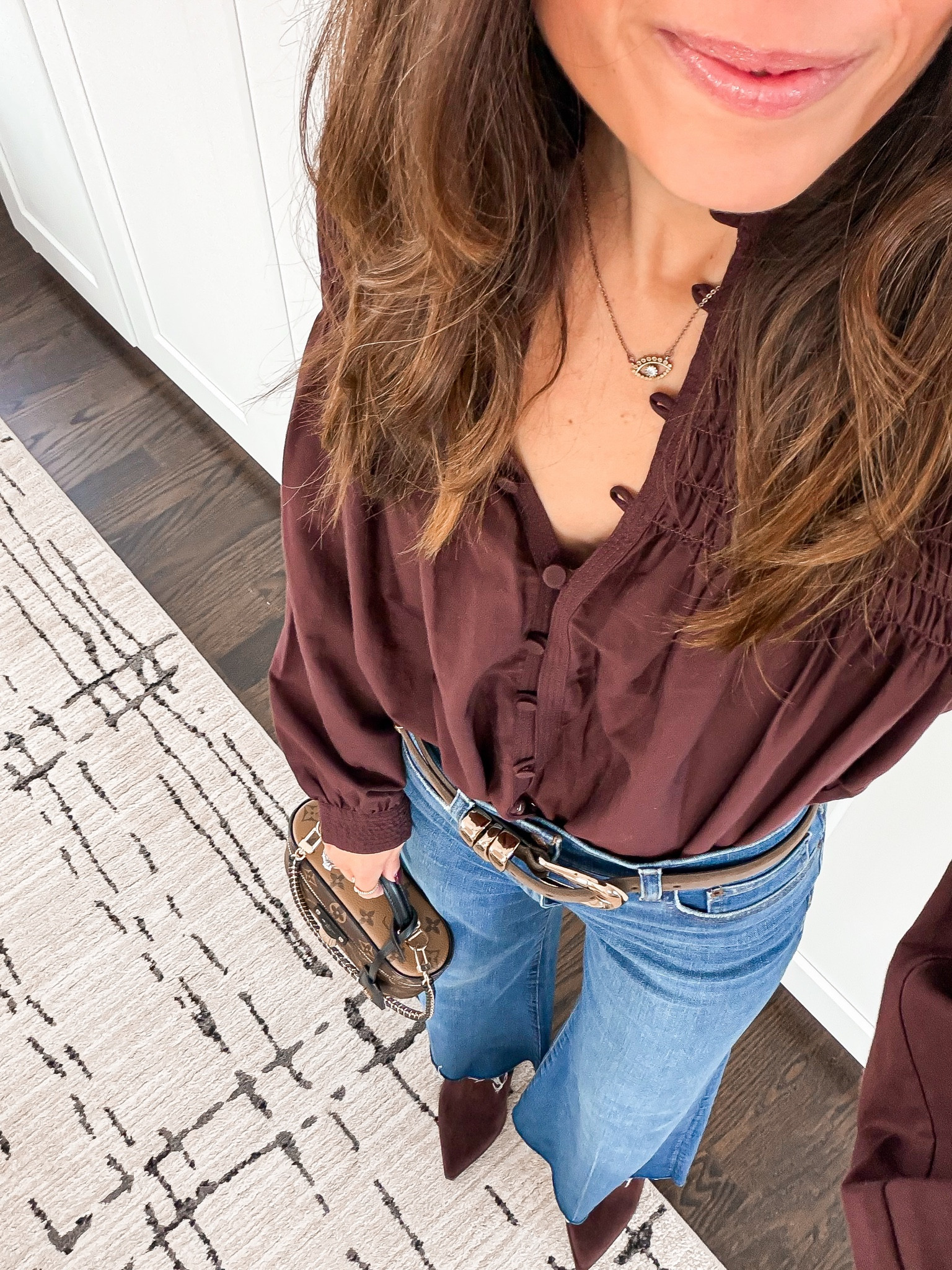 My go-to chocolate brown top for the holidays 🍫 Wearing size XS. So flattering and easy to dress up or down.

#LTKGiftGuide #LTKCyberWeek #LTKHoliday