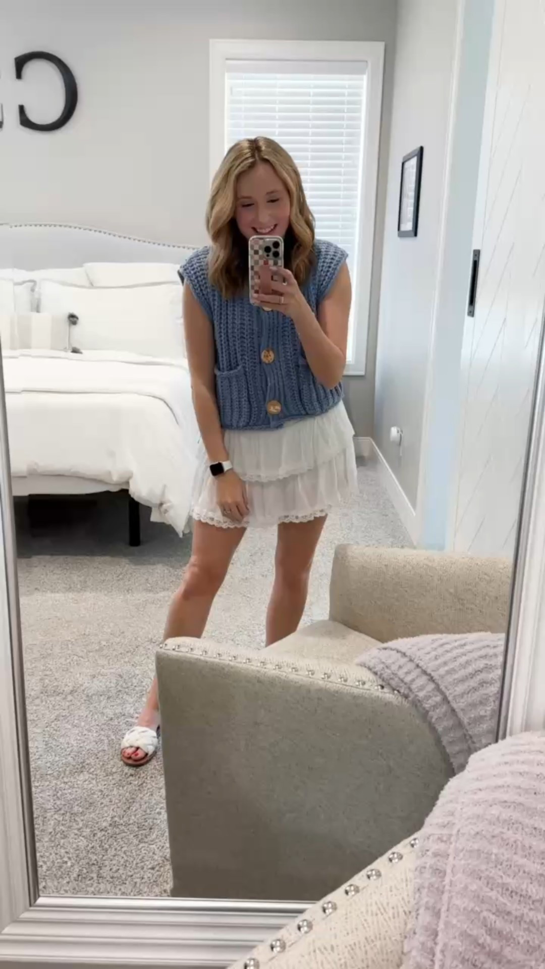 My followers are loving this blue sweater vest as much as I do. I initially paired with my jeans but wanted to show you my other option paired with this cute tiered skirt. I now have the vest in a cream color and a tan color too. Highly recommend this vest in any color!!

//
Sleeveless vest
Sweater vest
Knitted vest
Vest
Spring vest

#LTKStyleTip #LTKFindsUnder50