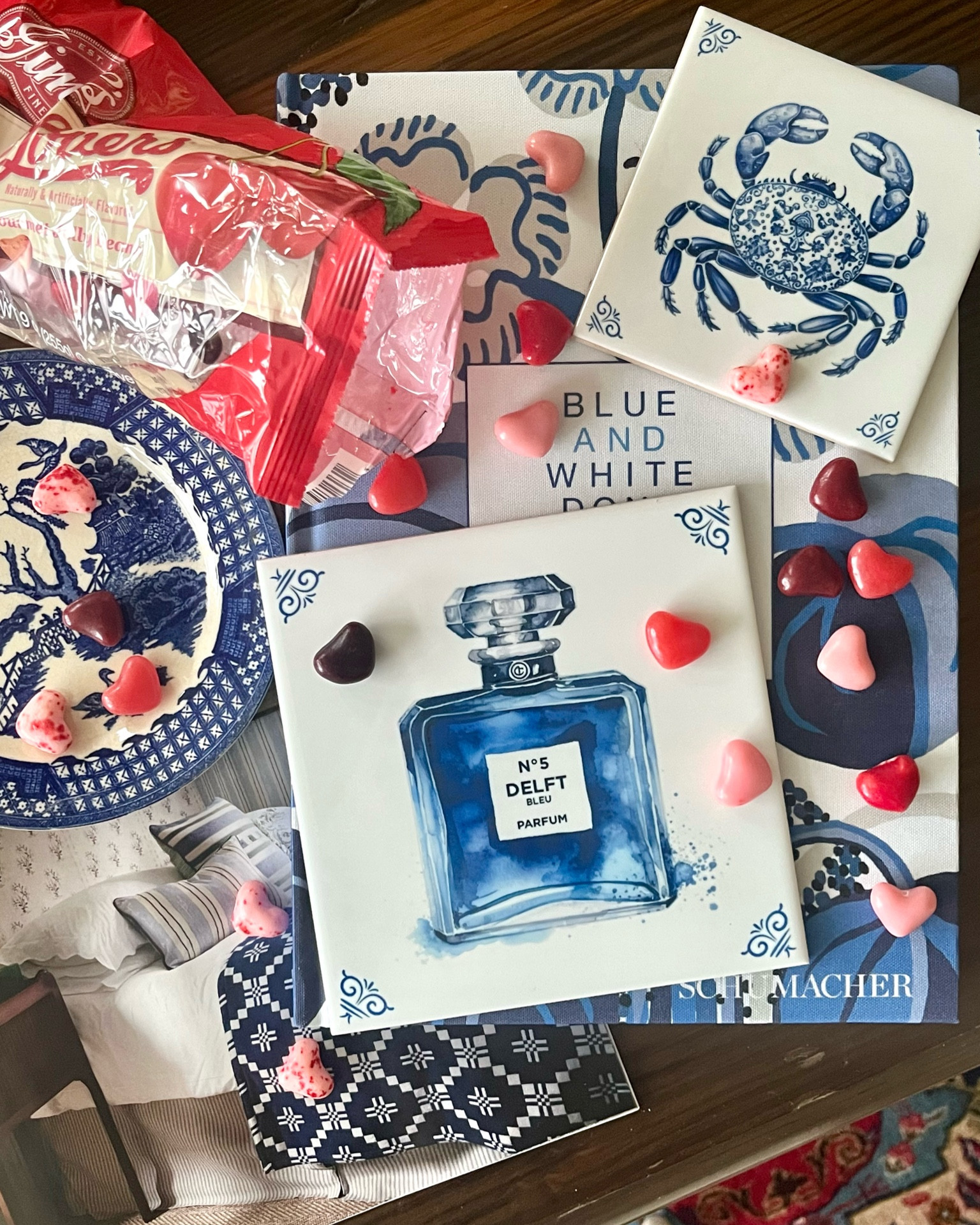 Made the [delicious] mistake of opening the heart shaped jelly beans I told you about the other day. Now I’m going to need to buy more! A yummy treat displayed with blue and white. These fun Dutch delft-inspired tiles could be a great gift - use the smaller size for coasters, the bigger could be a trivet or even display on a bamboo easel or frame them. Don’t have to be grouted to the wall... several other patterns to choose from. 

#LTKGiftGuide #LTKhome #LTKSeasonal