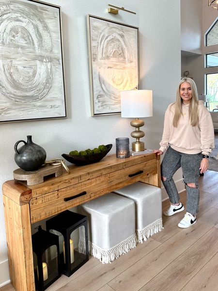 Linked my entryway decor and outfit! Amazon battery powered picture lights, Nike jumbo blazer sneakers, jeans, hoodie, gold lamp, modern home decor accents, Kirkland’s home, console table. 

#LTKFind #LTKFestival #LTKshoecrush