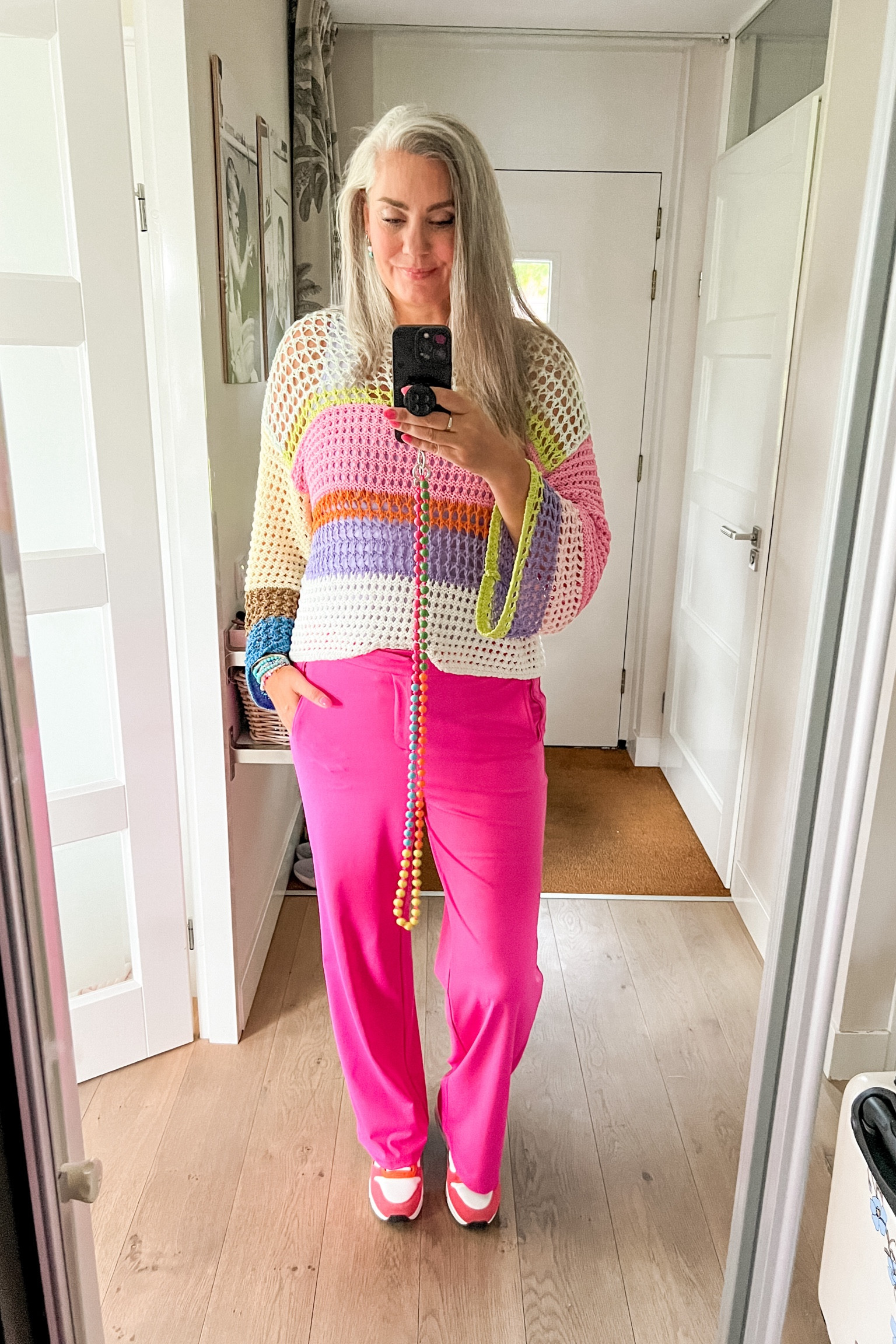 Ootd - Tuesday. Pink trousers (g-maxx) paired with a colorful striped coarse knitted sweater over a lavender tank top. Pink and orange Skechers sneakers. 



#LTKmidsize #LTKeurope #LTKnederlands