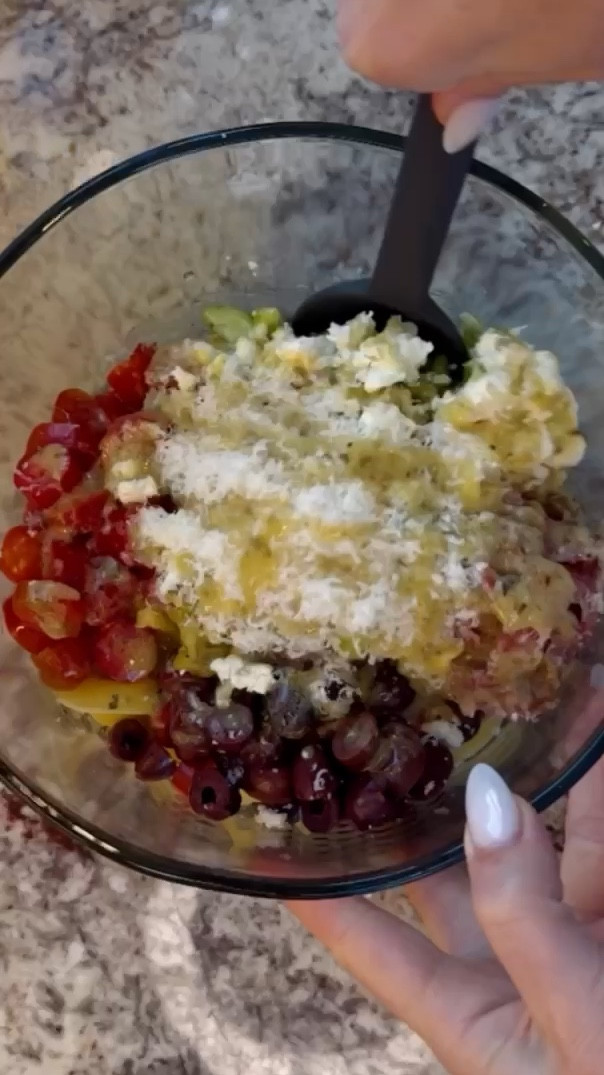 Easy & delicious pasta salad 

Pasta salad 

2 cups cooked cheese tortellini 
A heaping 1/2 cup each of the following:
   - Diced cucumber
   - Diced tomato 
   - Diced salami
   - Pitted kalamata olive 
1/3 cup finely chopped red onion 
2tbsp chopped pepperoncini 
1/2 cup fresh crumbled feta cheese 
1/2 cup grated Parmesan 

Dressing: 1/2 cup Italian or Greek vinaigrette + 1tbsp Dijon mustard + 2tsp honey (i used Ken’s Simply Greek dressing)

Combine all of your ingredients well and refrigerate for a few hours before serving! (You can customize this by adding or subtracting anything and it will still be amazing, pasta salad is life haha !) 
Enjoy 🥰

#LTKfindsunder50 #LTKfamily #LTKparties