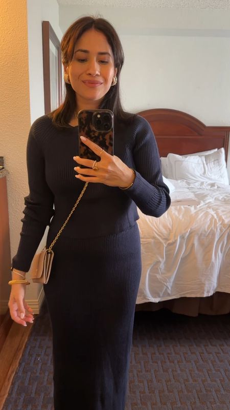 Fall outfit inspo! Conference look day 1 wearing this matching knitwear skirt set. Long fitted skirt with a long sleeved crop top that’s longer on me. Got it in navy in a size small 

#LTKfindsunder50 #LTKstyletip #LTKSeasonal