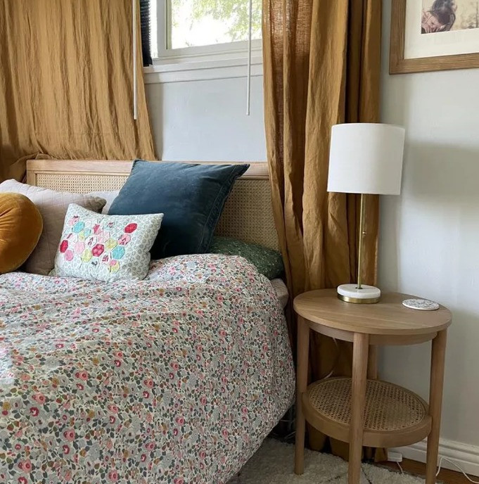 Elevate your living room, bedroom, or reading nook with this Wood & Cane Round Accent Side Table from Hearth & Hand™ with Magnolia. Featuring a warm wood finish and handwoven cane detailing, this round side table brings timeless modern farmhouse style to any space. Perfect as a sofa side table, bedside table, or accent table for small spaces, it blends natural texture with clean, minimalist design. Style it with neutral décor, cozy lighting, or a statement vase for an effortlessly curated look inspired by Magnolia home décor and Joanna Gaines–style interiors.

Highlights:
Round accent table with 4 leg support
Built-in bottom shelf with decorative lattice design
Comes with floor protectors
Natural wood blends with the color schemes in your space 

 #LTKHome