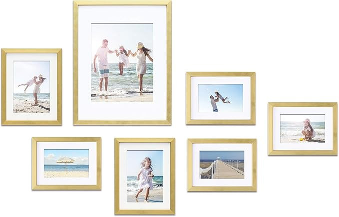 Mimosa Moments Gallery Wall Frame Set with mat for one 8x10, two 5x7 and four 4x6 pictures (Gold,... | Amazon (US)