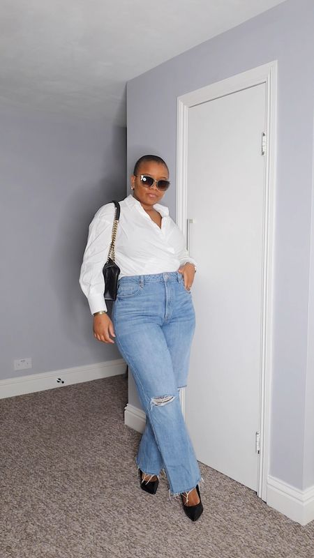 An effortless way to style a pair of ripped denim pants. Just add a long sleeve poplin shirt. A pair of black heels and bag. Sunglasses for a little extra. Effortless chic executed.

#LTKworkwear #LTKstyletip #LTKVideo