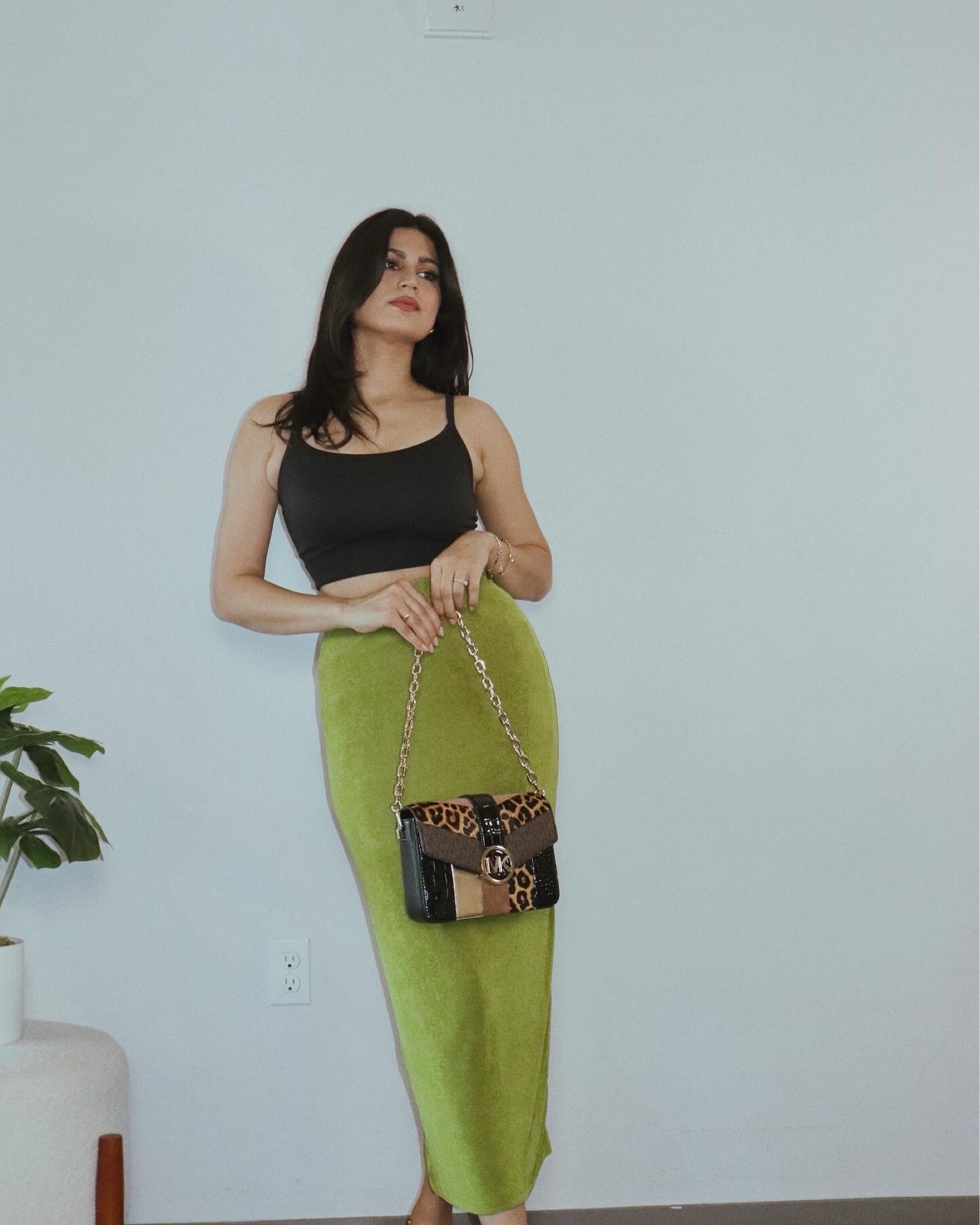 I am wearing Uniqlo Seamless half bra camisole in black , comes with built in bra. It fits like a glove and is true to size

#LTKStyleTip