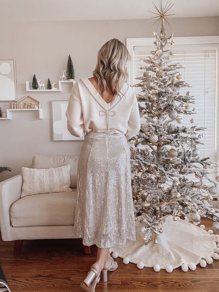 All White Holiday Outfit
sequin skirt | rhinestone shoes | bow sweater | Christmas 

#LTKsalealert #LTKshoecrush #LTKHoliday