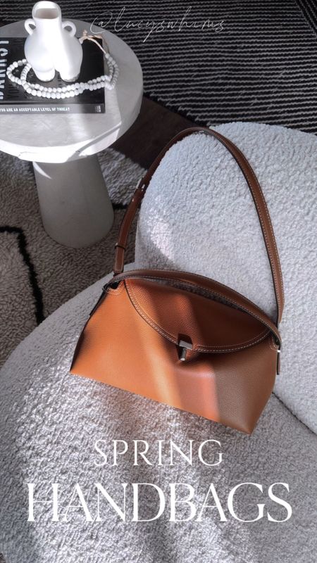 Spring Handbag Edit: 16 handbags on my radar this season and the bag I keep on reaching for! I love it so much, I’m considering getting the cream as well! 🤍

#LTKstyletip #LTKSeasonal #LTKVideo