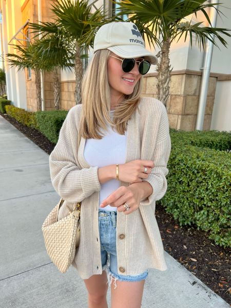 Jenni Kayne Cocoon cardigan on sale! My favorite cashmere cardigan that has lasted me for 5 years. Worth the investment! I hand wash mine and it still fits, feels and looks brand new. 

Travel outfit, resort wear, denim shorts 

#LTKtravel #LTKSeasonal #LTKSpringSale