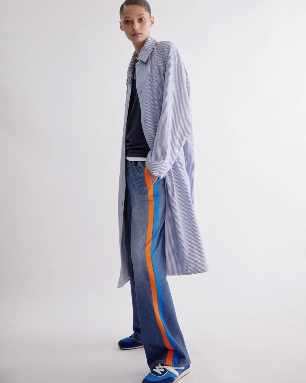 Obsessed with the ORANGE stripe 🧡
These limited-edition track pants fuse the hyperrealistic illusion of lived-in "denim" with side stripes in vibrant colors. Printed on ultra-soft cotton using our signature Miramar technique and finished with a pull-on elastic waistband and hidden side-seam pockets, they blur the line between jeans and sweats. Perfect for game-day style.

#LTKOver40 #LTKootd #LTKmomlife
