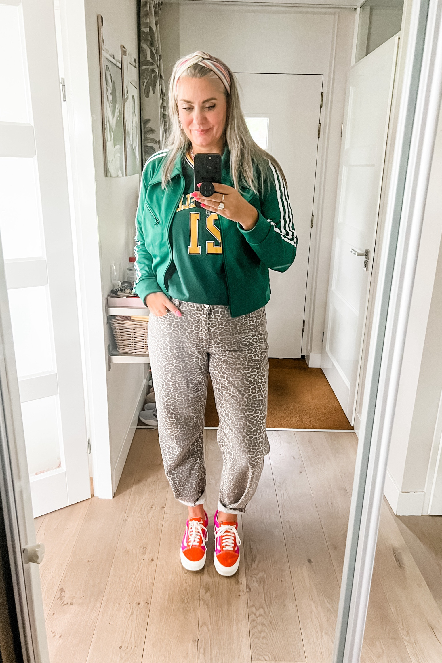 Ootd - Wednesday. Bottle green Adidas retro jacket over a green and yellow baseball shirt paired with leopard jeans and pink and orange Vans for the ⚽️ game 😜

#LTKnederlands #LTKeurope #LTKmidsize
