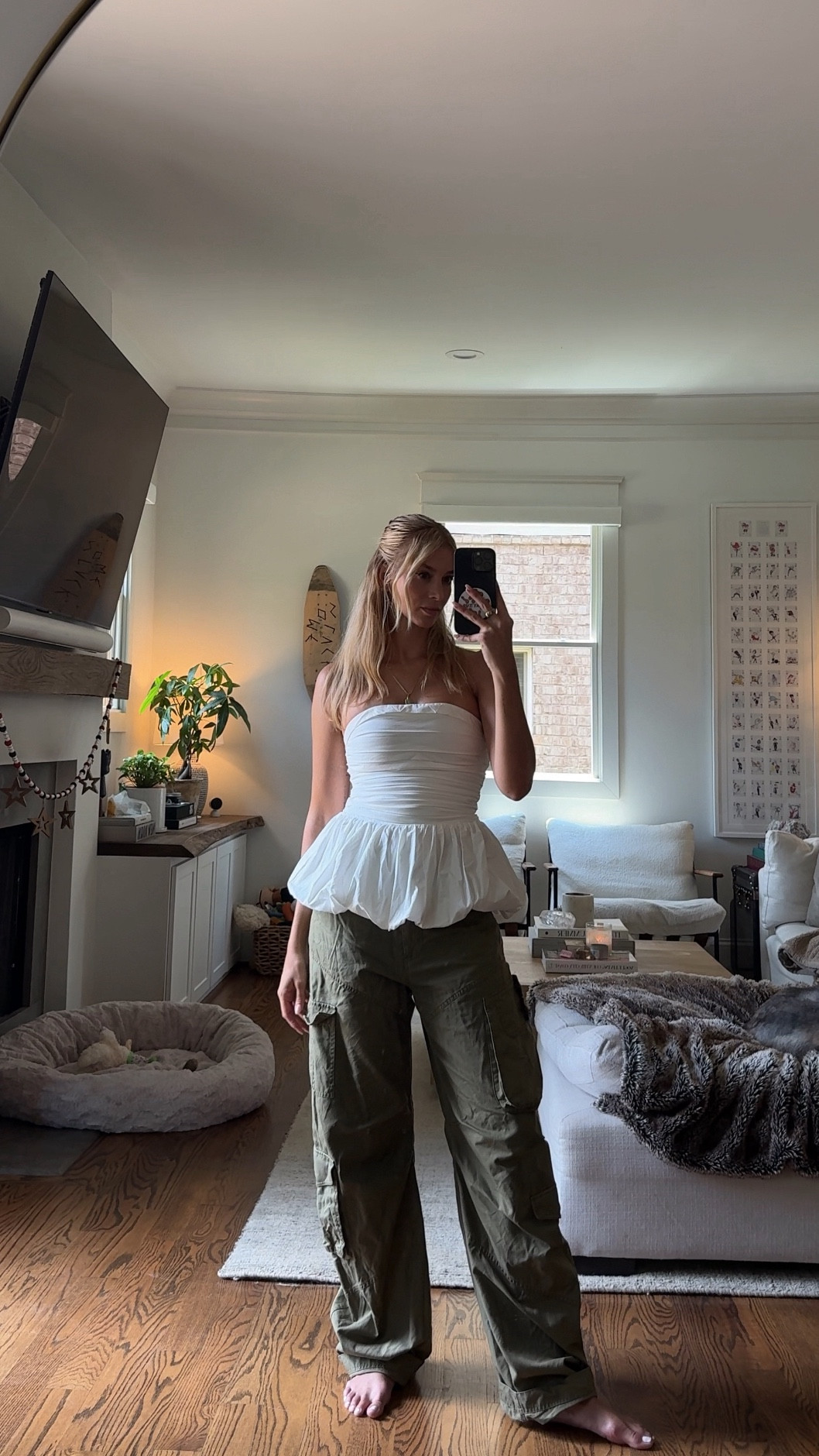 Loving the contrast lately—structured, feminine tops with chill cargo pants are my current uniform 🤍 This top is a size 4 and fits like a dream. I love the way Yukie is always watching me 😭🐾 #LTKstyle #ContrastVibes #CargoAndCute

#LTKStyleTip