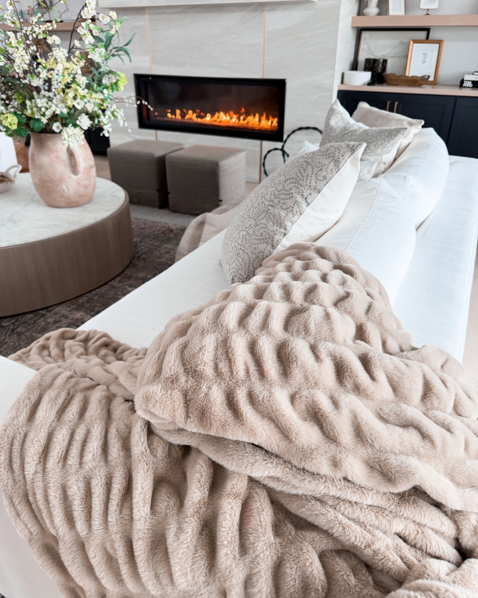 The best blanket to cozy up for a snow day! Use code ASHLEENICHOLS35 for 35% off Lola blankets! ❄️ 

#LTKHome