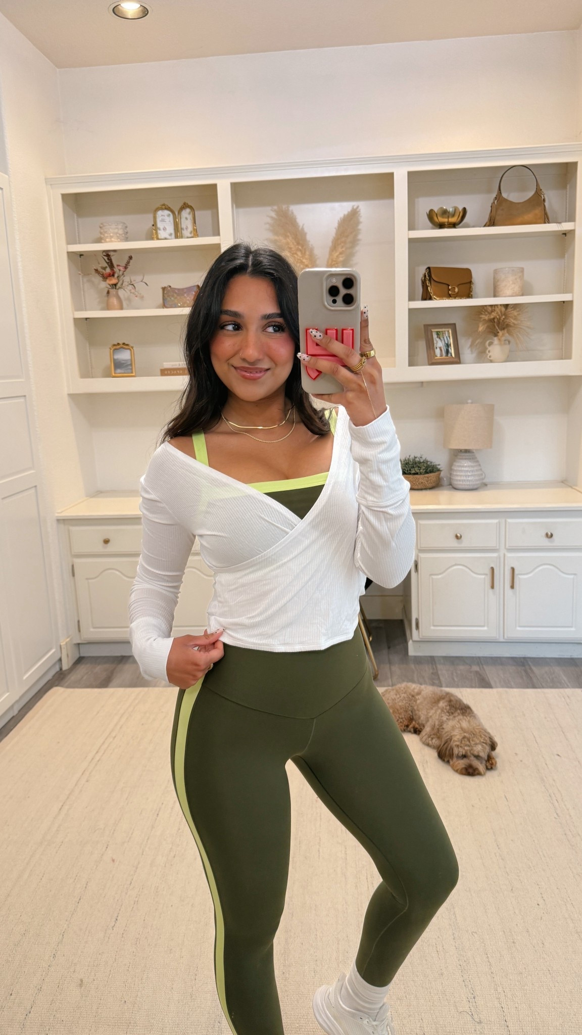 My fav wrap top! It’s so easy to throw on top of any set. It’s such a good staple!! $22! 

Wearing a small:)